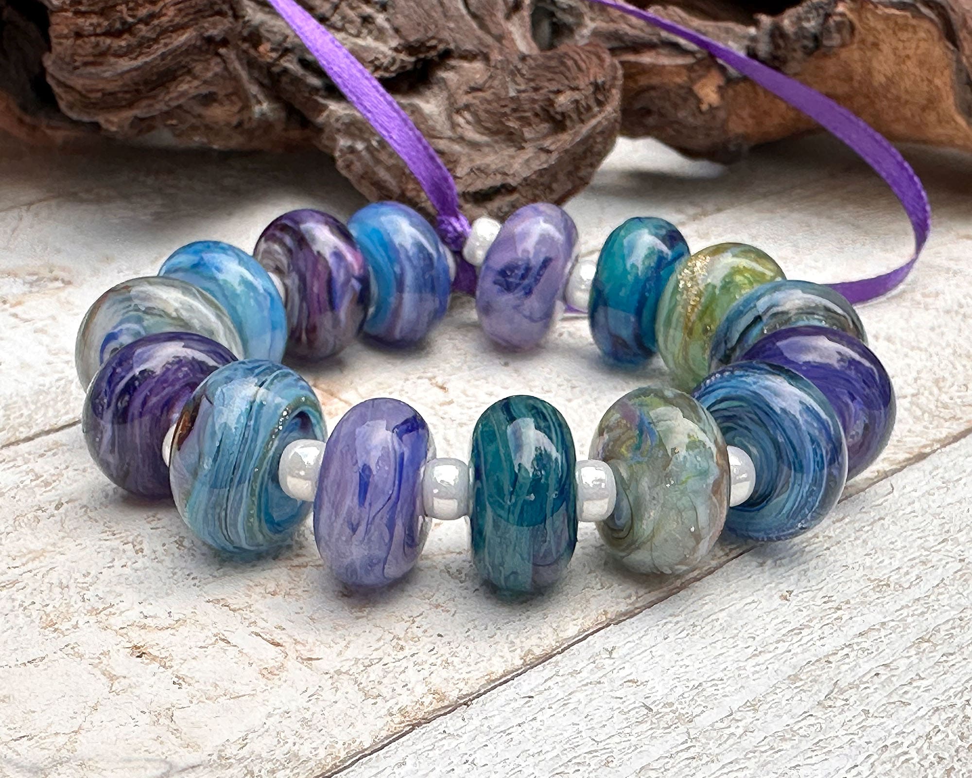 14 Blue Purple Handmade Lampwork Glass Beads Set for Jewelry Making - DIY Bracelet, Necklace, Earring Designs - Perfect for Crafters and Beading Enthusiasts