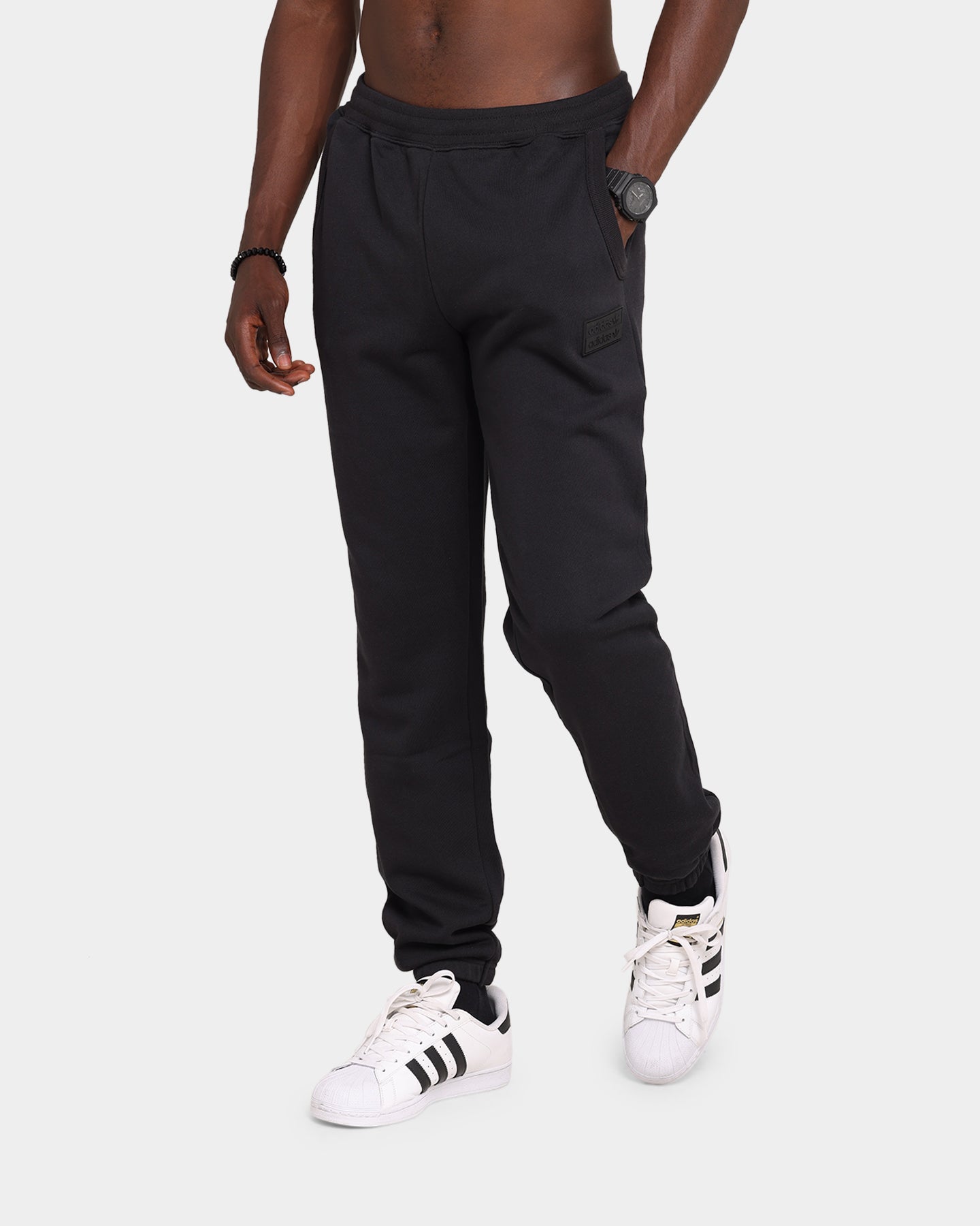 Adidas Men's Black Silicon Sweatpants - Comfortable Athletic Joggers for Running, Gym & Lounge Wear