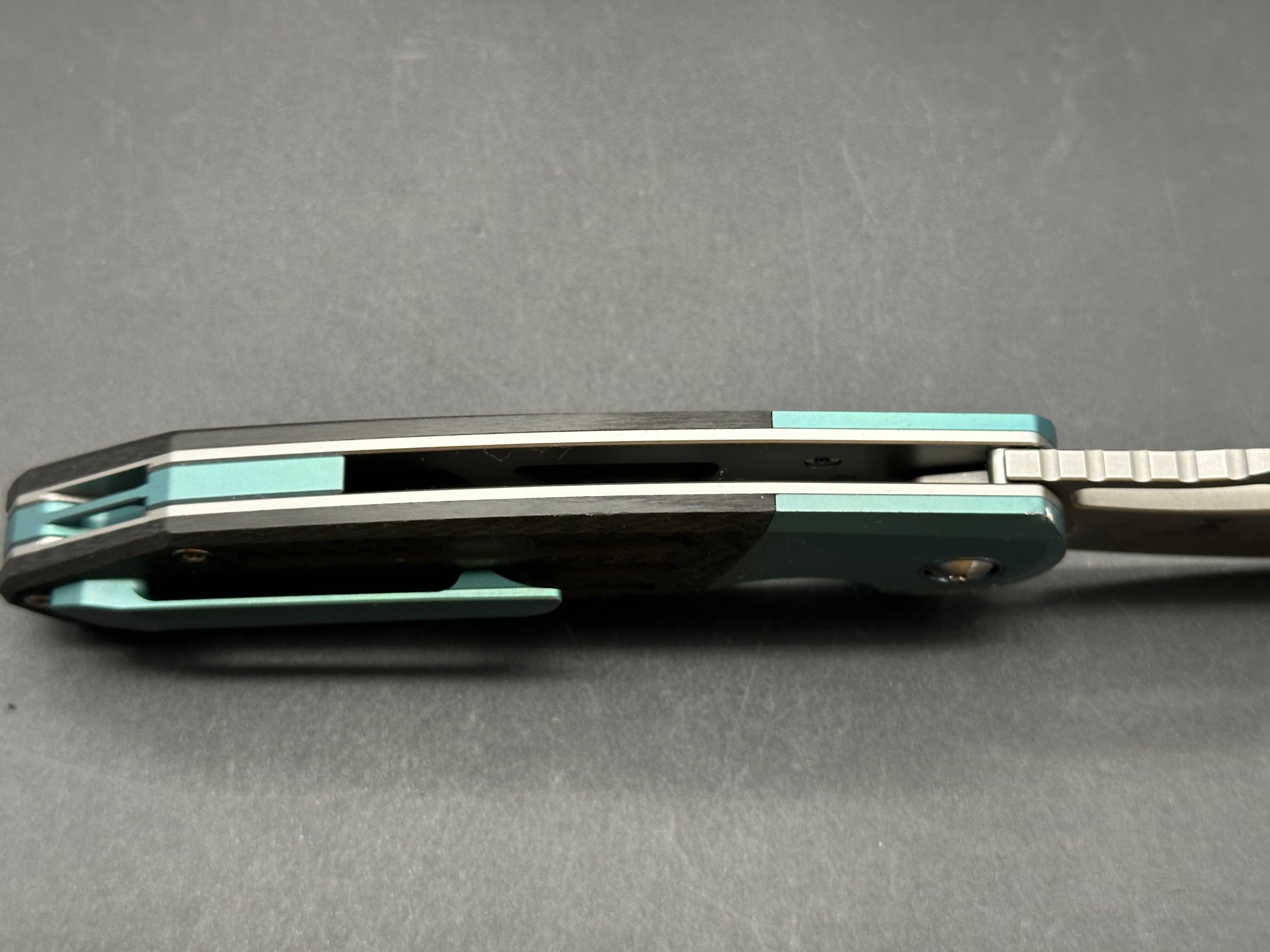 SIXLEAF SL 24 Jerry Jelly Pocket Knife - Plain Edge D2 Blade, Green Titanium Bolster & Carbon Fiber Handle - EDC, Camping, Hiking, Survival Gear