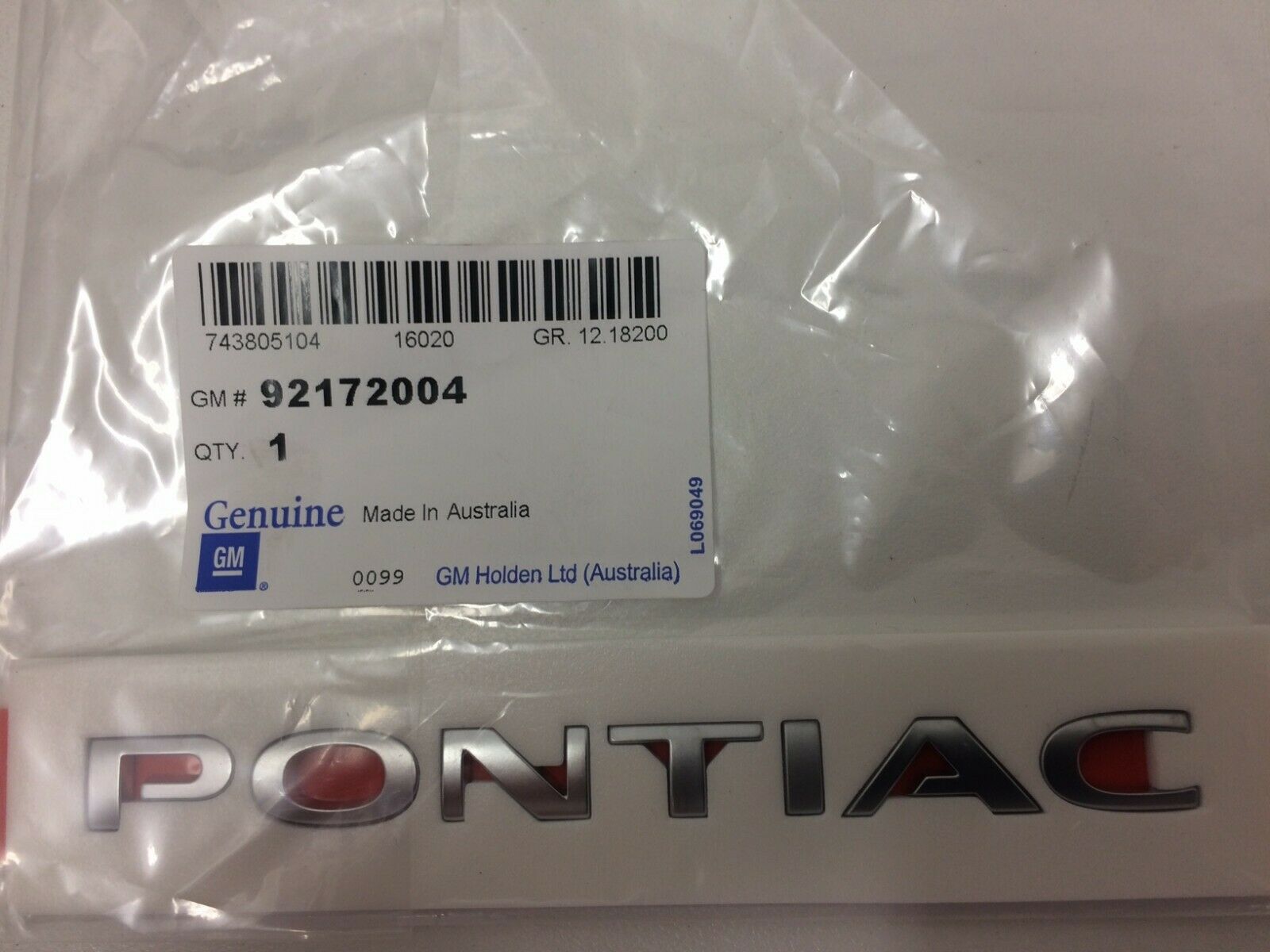 Genuine Pontiac GTO 2004-2006 Trunk Lid Emblem Badge - OEM Replacement Part for Classic Car Restoration & Customization