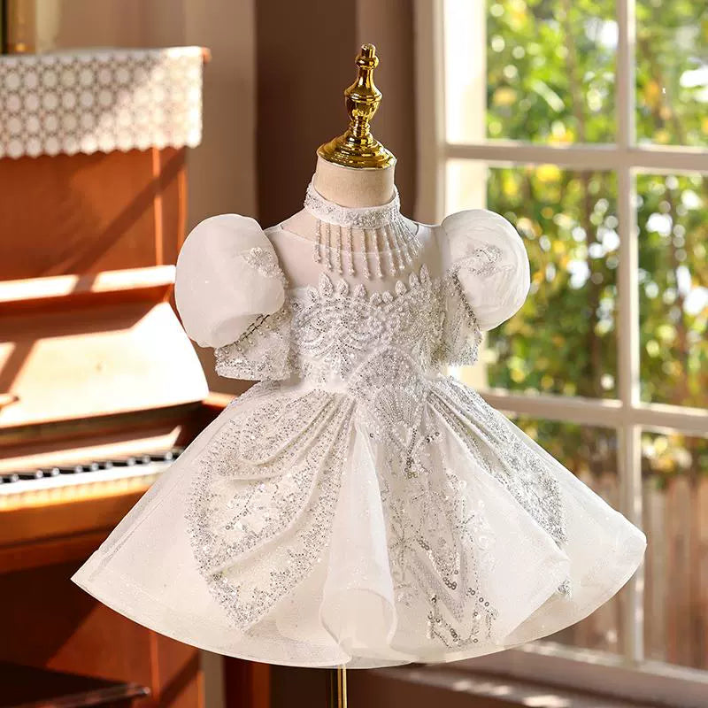 Sparkling White Sequined Flower Girl Dress with Lace Details & Puff Sleeves - Elegant A-Line Design for Weddings, Parties & Special Occasions