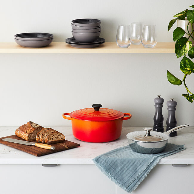 Le Creuset 4.2 Quart Round Dutch Oven in Oyster - Premium Enameled Cast Iron Cookware for Braising, Stewing & Baking - Perfect for Soups, Casseroles & Bread Making