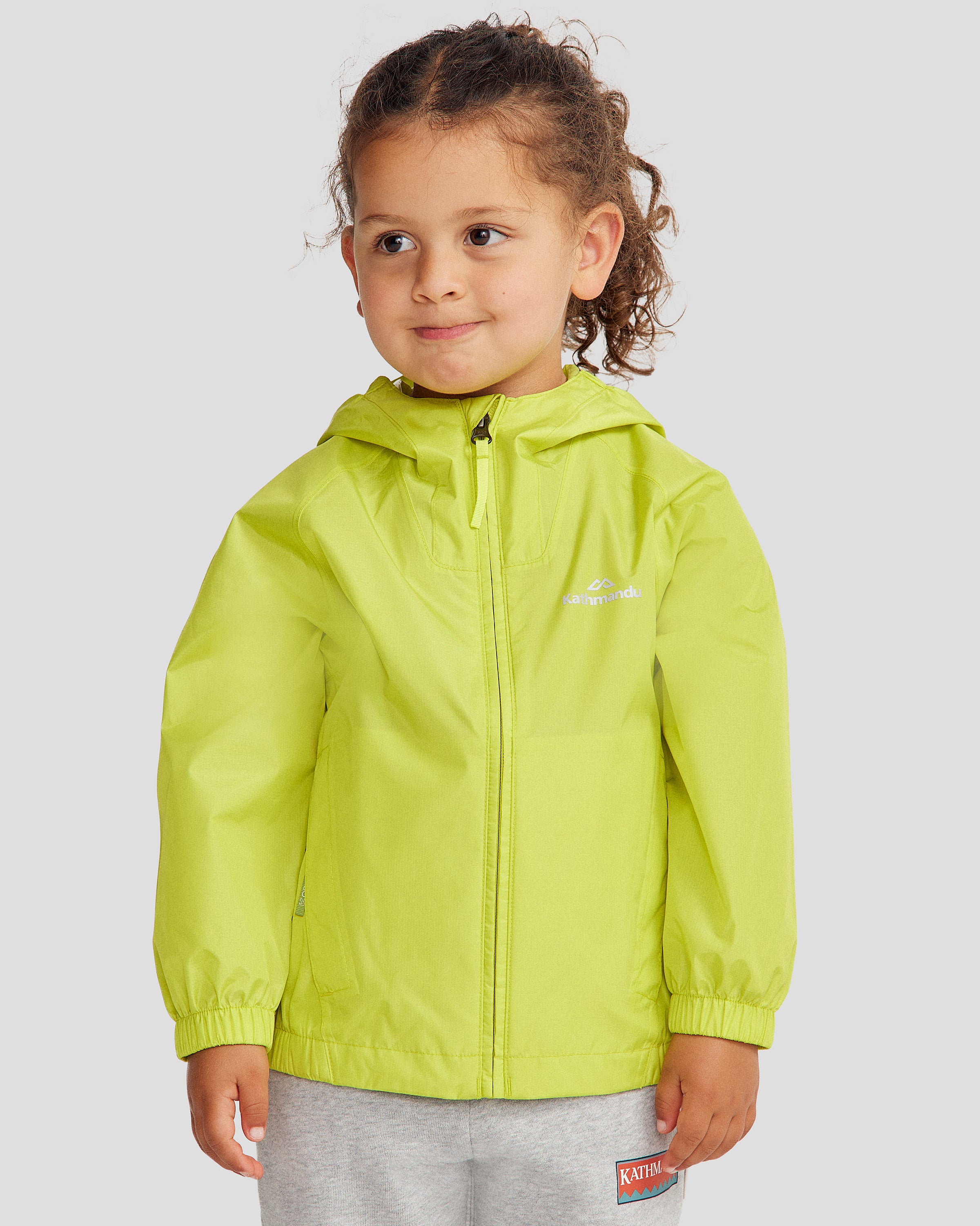 Kids Pocket it 2L Waterproof Rain Jacket v4 - Bright Moss Green | Lightweight Outdoor Windbreaker for Boys & Girls | Perfect for School, Hiking & Playtime