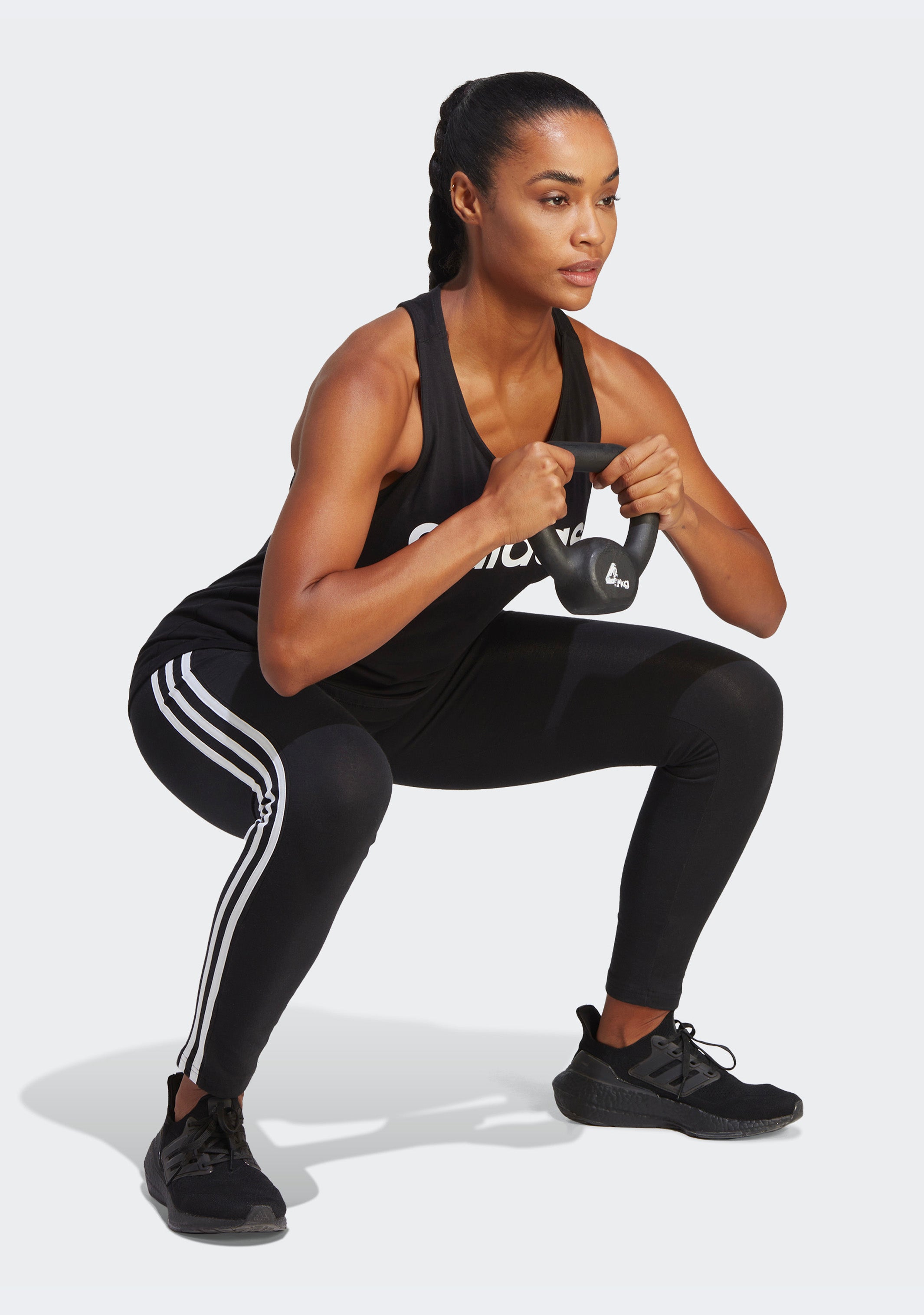 Adidas Women's Essentials Loose Fit Logo Tank Top - Breathable Workout Shirt for Running, Yoga & Gym - Comfortable Athletic Wear for Women