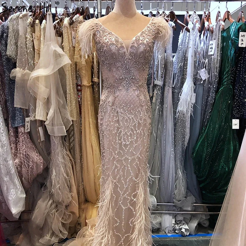 Elegant Champagne Mermaid Evening Dress with Diamond Feathers - Sleeveless Formal Beaded Gown for Women | Perfect for Prom, Wedding Guest & Black Tie Events - LA70350