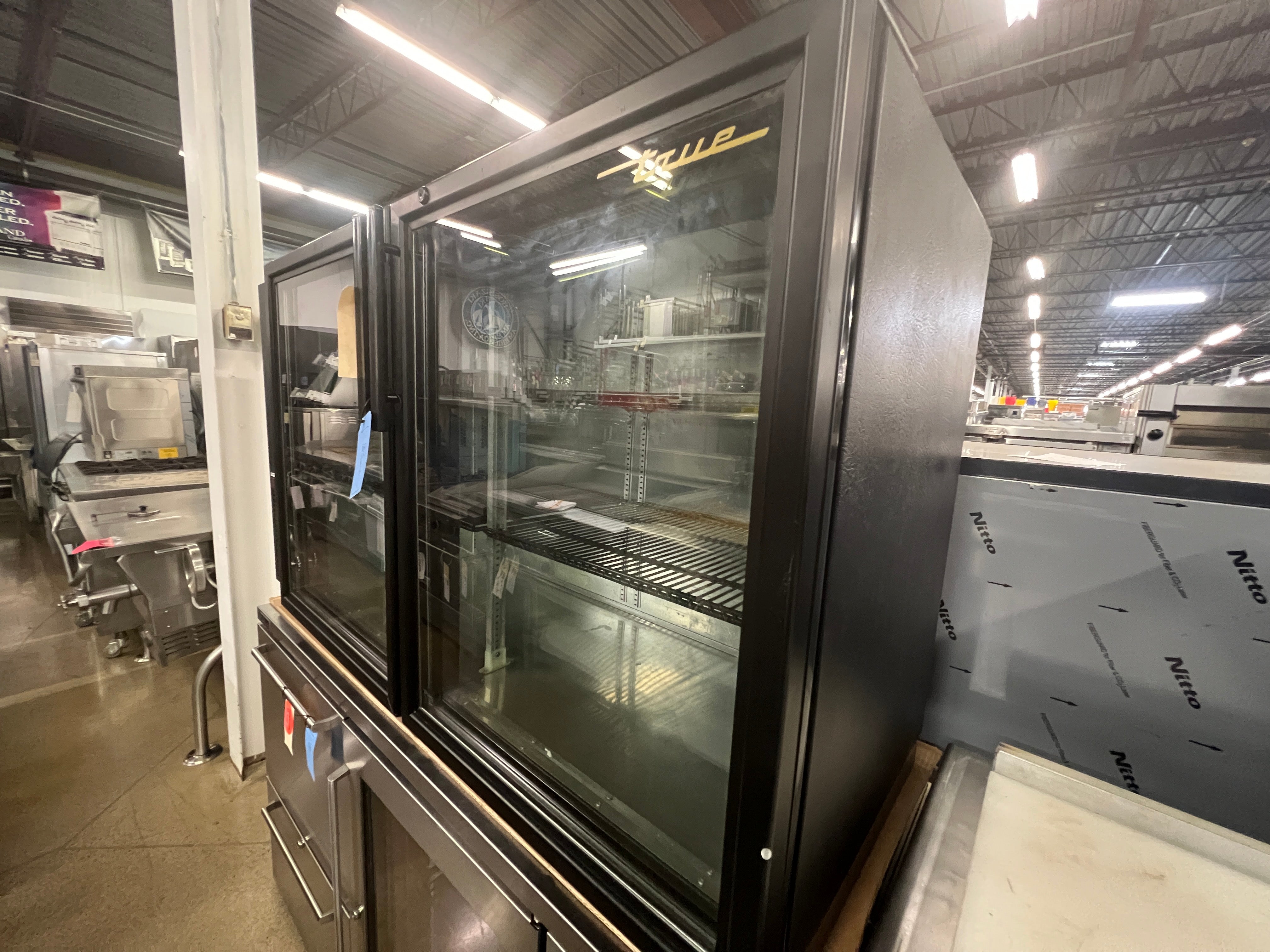 Used True TBB 24 Gallon 60G 60 Glass Door Black Back Bar Refrigerator - Perfect for Bars, Restaurants & Commercial Kitchens