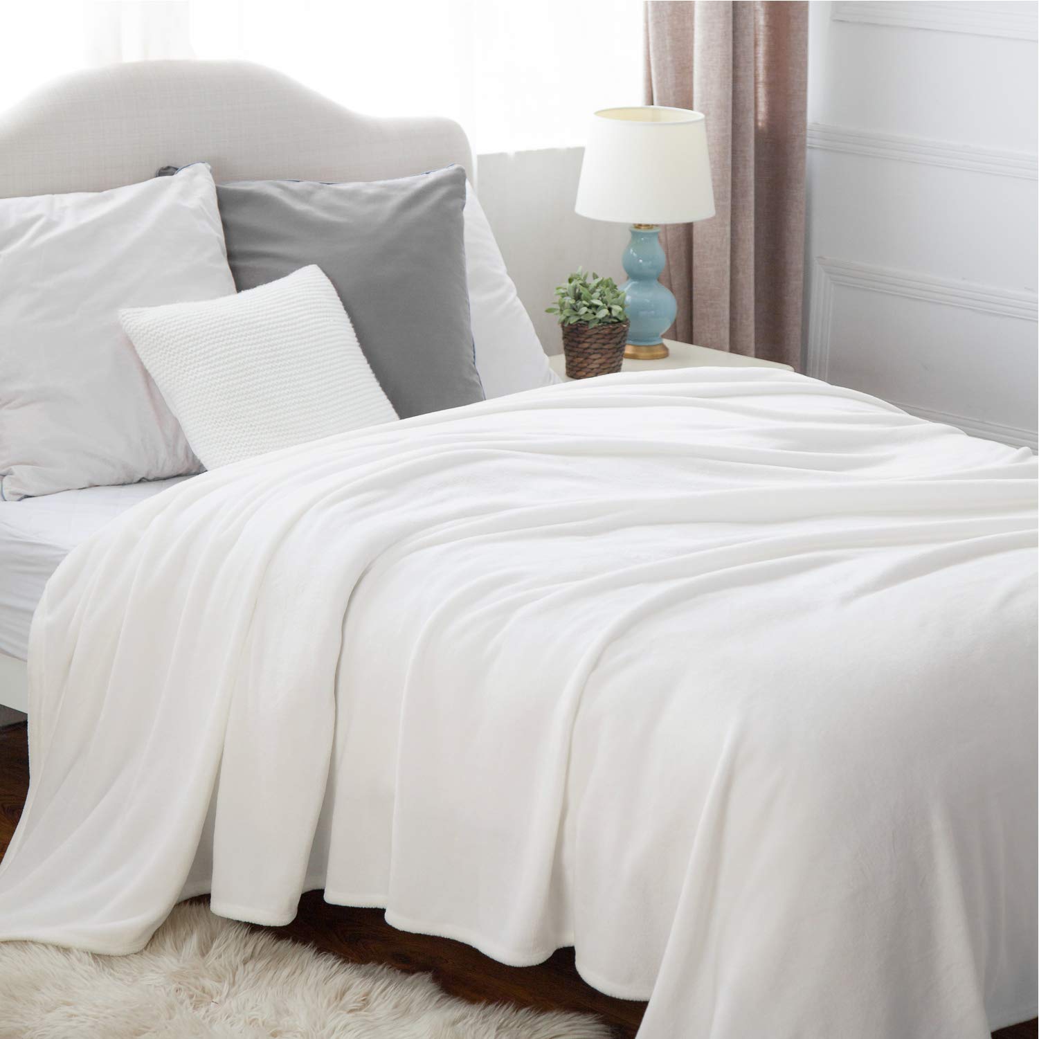 Bedsure 300GSM Fleece Blanket - Ultra Soft & Cozy Twin Size Plush Blanket (60x80 Inches) in White | Lightweight Warm Throw for Bed, Sofa, Couch | Perfect for Home, Travel & Camping | Machine Washable