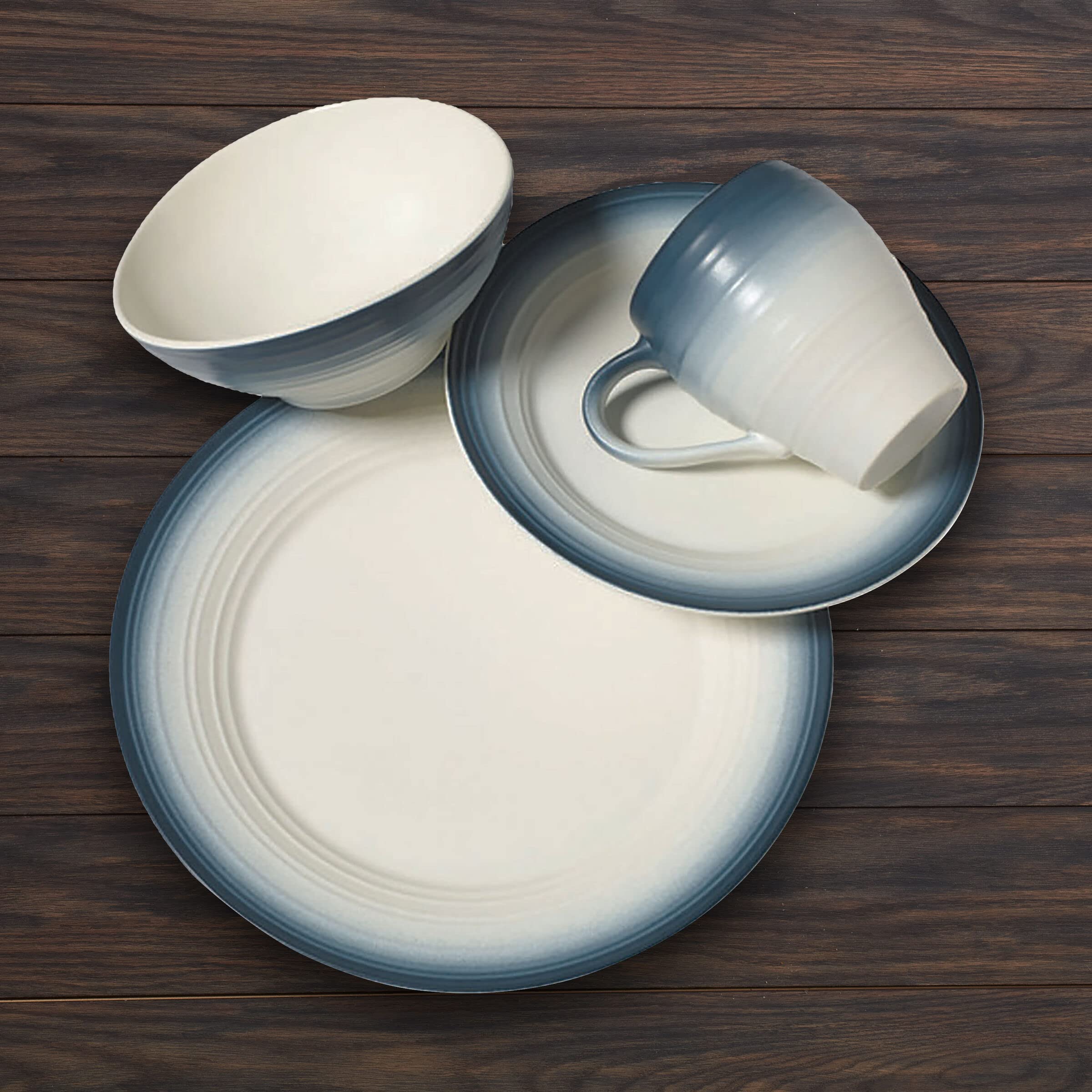 Mikasa Swirl 16-Piece Dinnerware Set for 4 - Elegant Blue Porcelain Plates, Bowls & Mugs - Perfect for Family Dinners, Entertaining Guests & Everyday Use