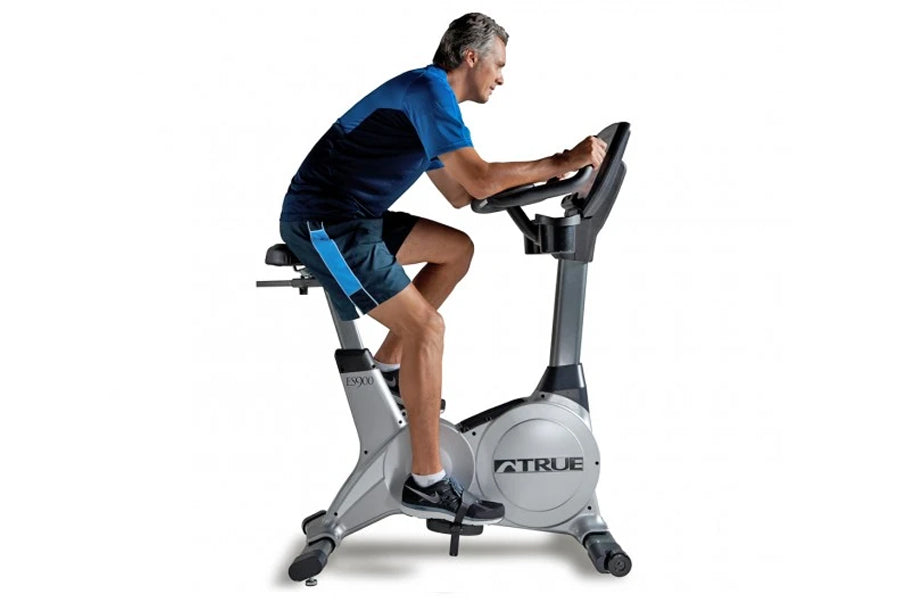 TRUE ES900 Upright Exercise Bike for Home Gym - Magnetic Resistance Indoor Cycling Bike with LCD Monitor, Adjustable Seat & Quiet Operation - Perfect for Cardio Workouts, Weight Loss & Fitness Training