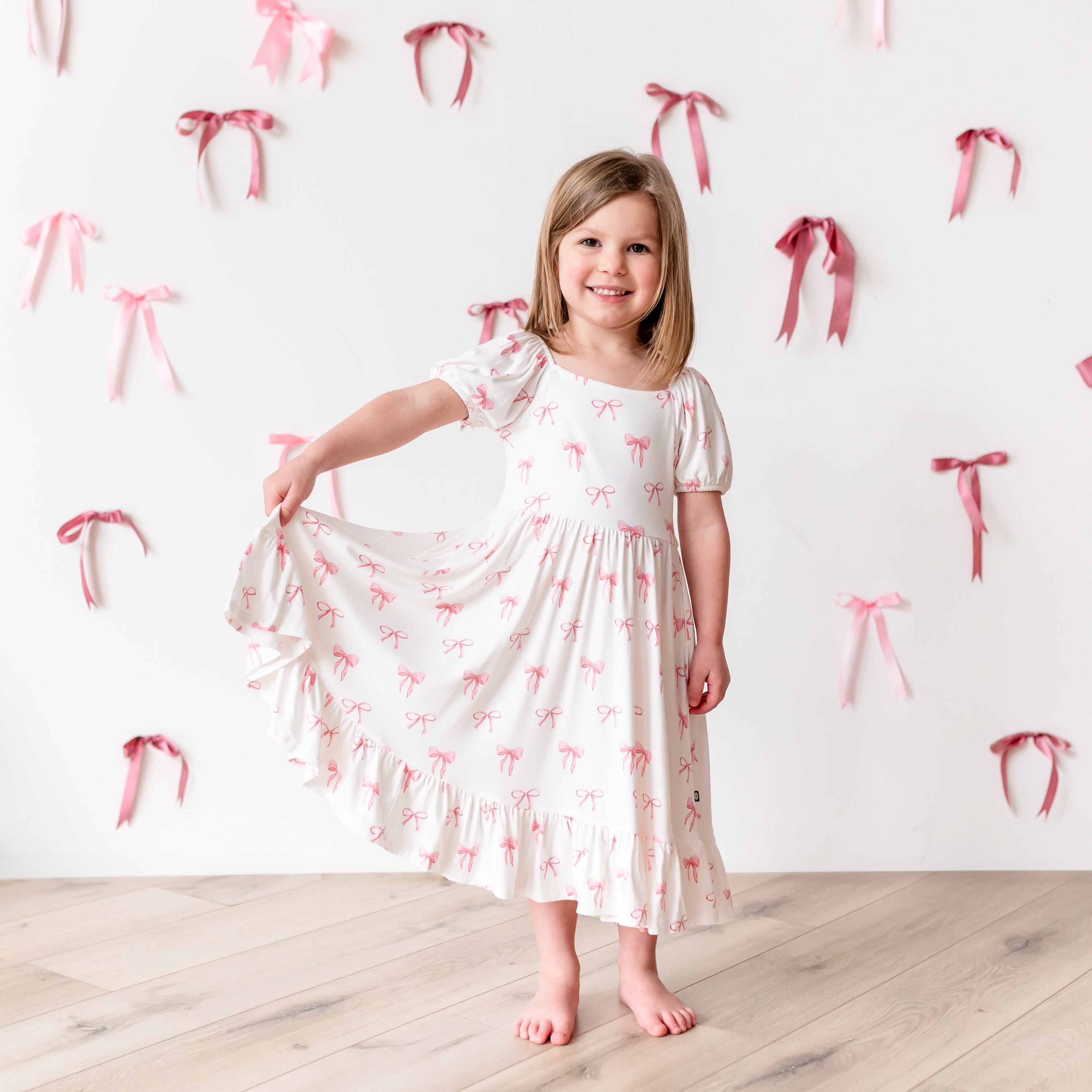 Elegant Puff Sleeve Twirl Dress with Bow Detail - Perfect for Parties, Weddings & Special Occasions