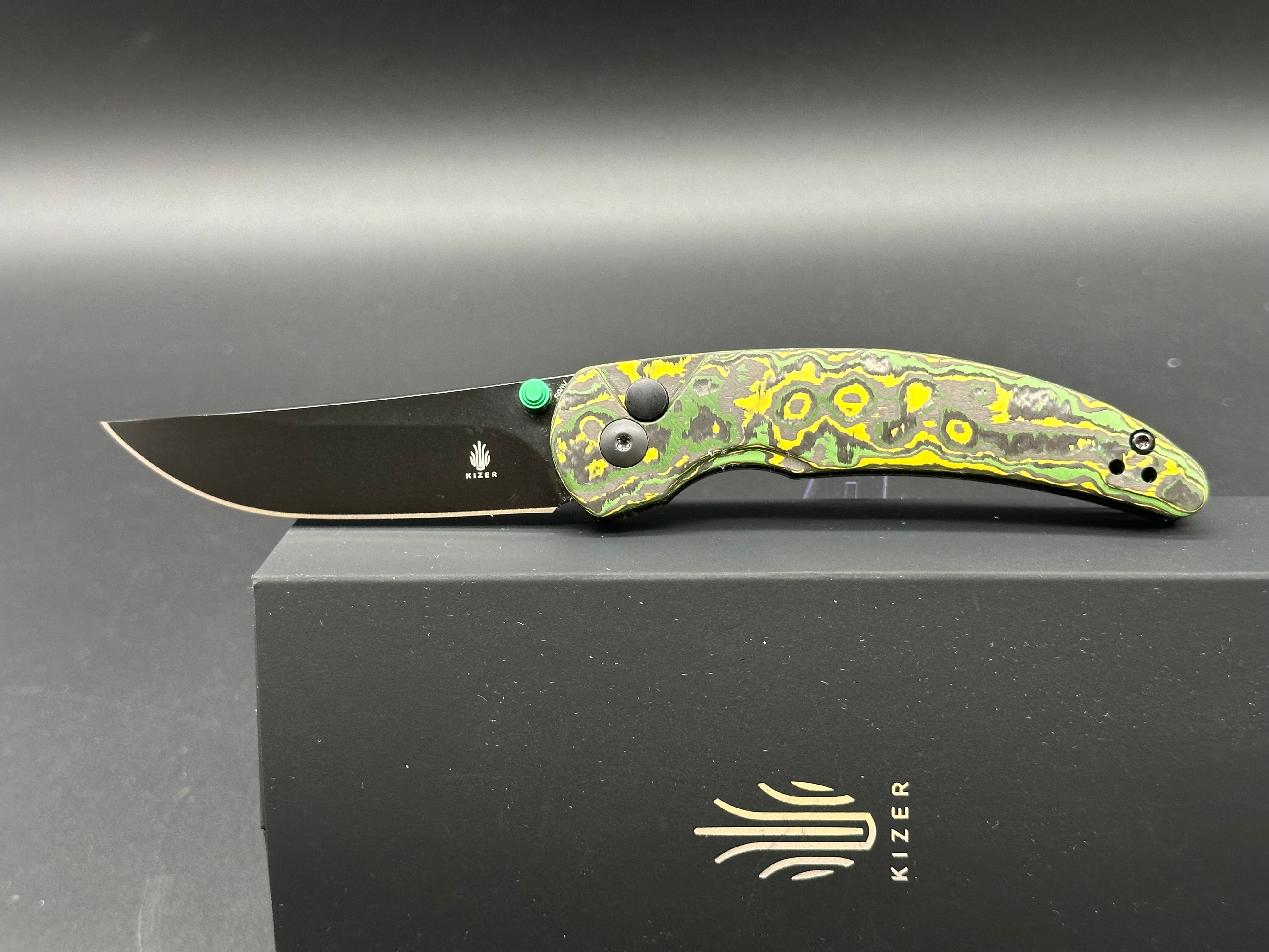 KIZER Chili Pepper Button Lock Knife - S90V Plain Black Blade, Toxic Storm Fatcarbon Handle - EDC Pocket Knife for Outdoor, Camping & Everyday Carry