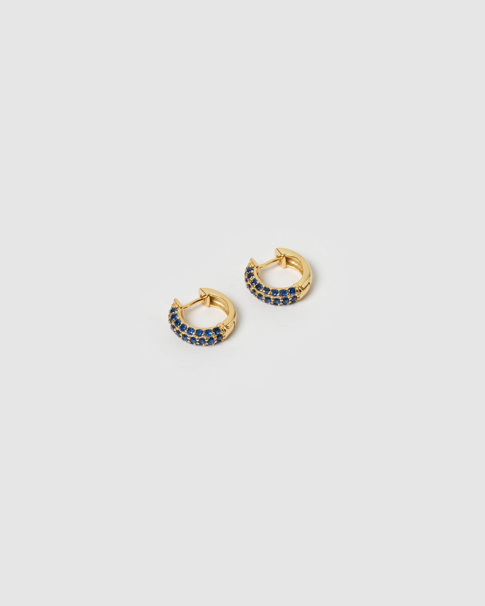 Izoa Mini Huggie Hoop Earrings for Women - 14K Gold Plated Blue CZ Studs - Dainty Everyday Jewelry for Work, Date Night & Gifting
