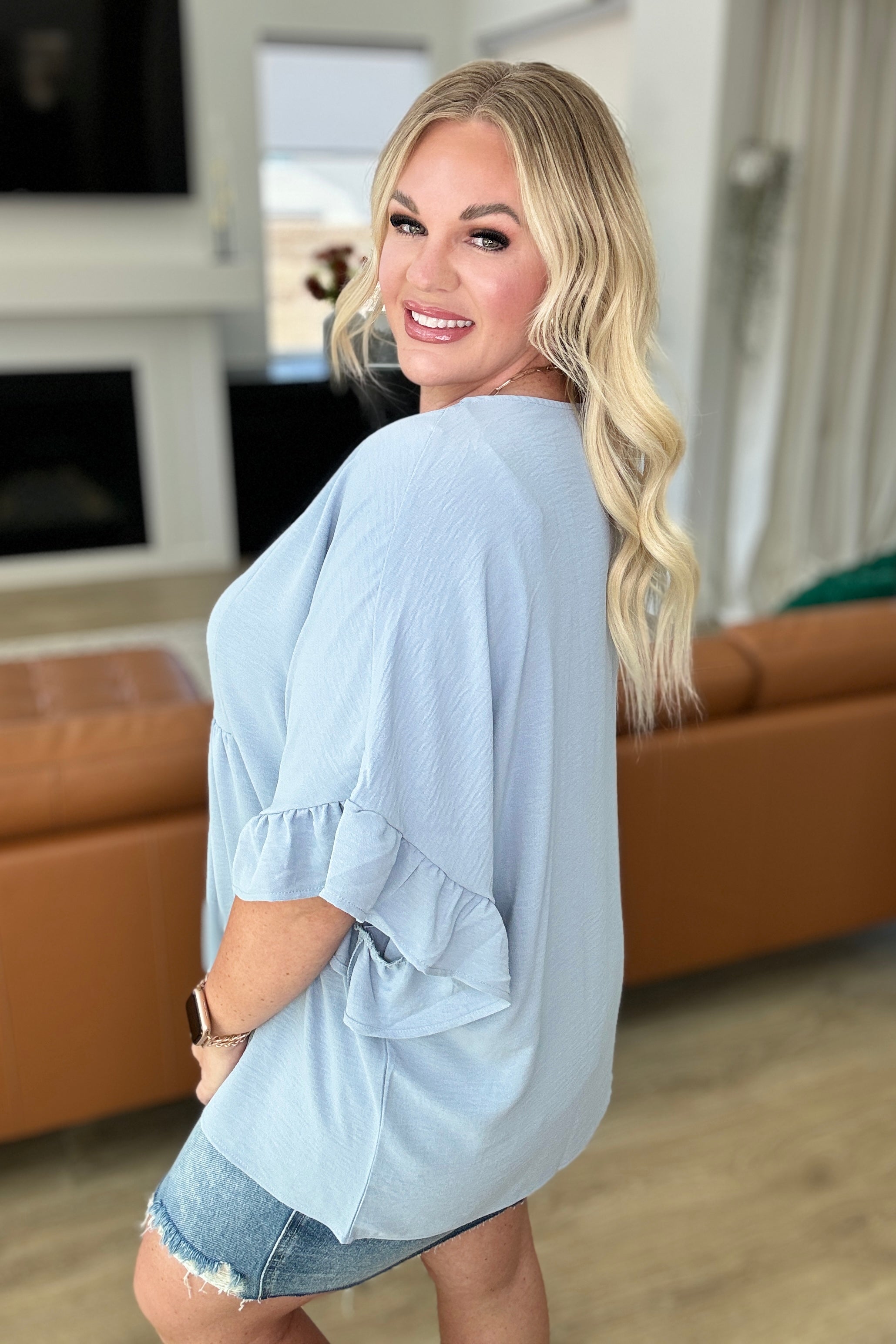 Stylish Airflow Peplum Ruffle Sleeve Blouse in Chambray Blue - Perfect for Summer Outfits & Casual Office Wear