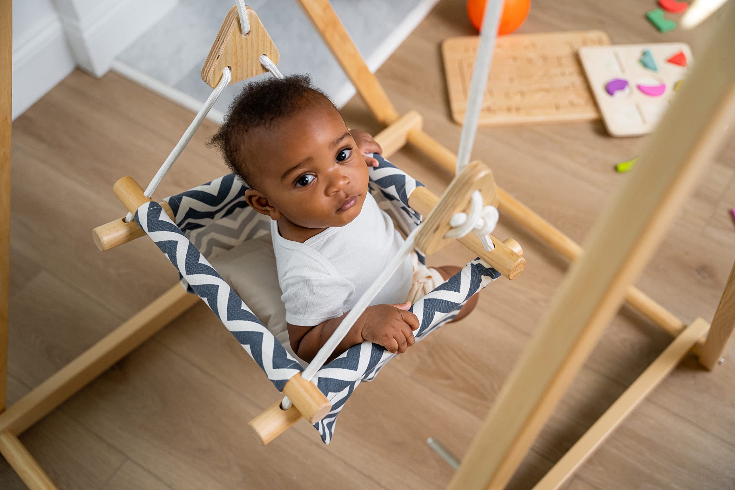 Avenlur Spruce Baby Swing with Stand - Foldable Toddler Swing with Safety Belt & Soft Pillow - Indoor/Outdoor Free Standing Swing for Kids 6 Months to 3 Years - Montessori Waldorf Style Swing for Playroom, Backyard & Nursery