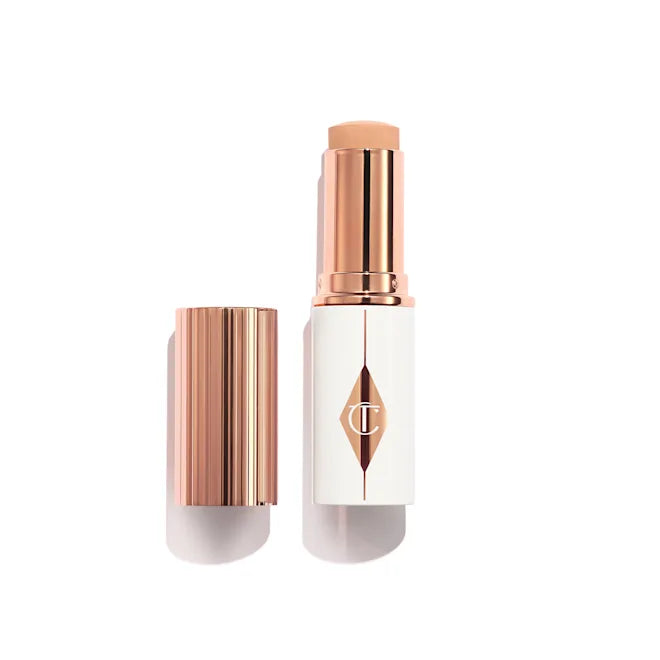 Charlotte Tilbury Unreal Skin Sheer Glow Tint Hydrating Foundation Stick - Lightweight Buildable Coverage, SPF Protection (Shade 4 Fair) for Flawless Everyday Makeup & On-The-Go Touch Ups
