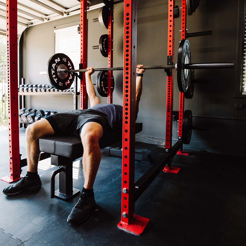 TITAN Series Adjustable Single Post Flat Weight Bench for Home Gym - Heavy Duty Strength Training Equipment for Full Body Workouts