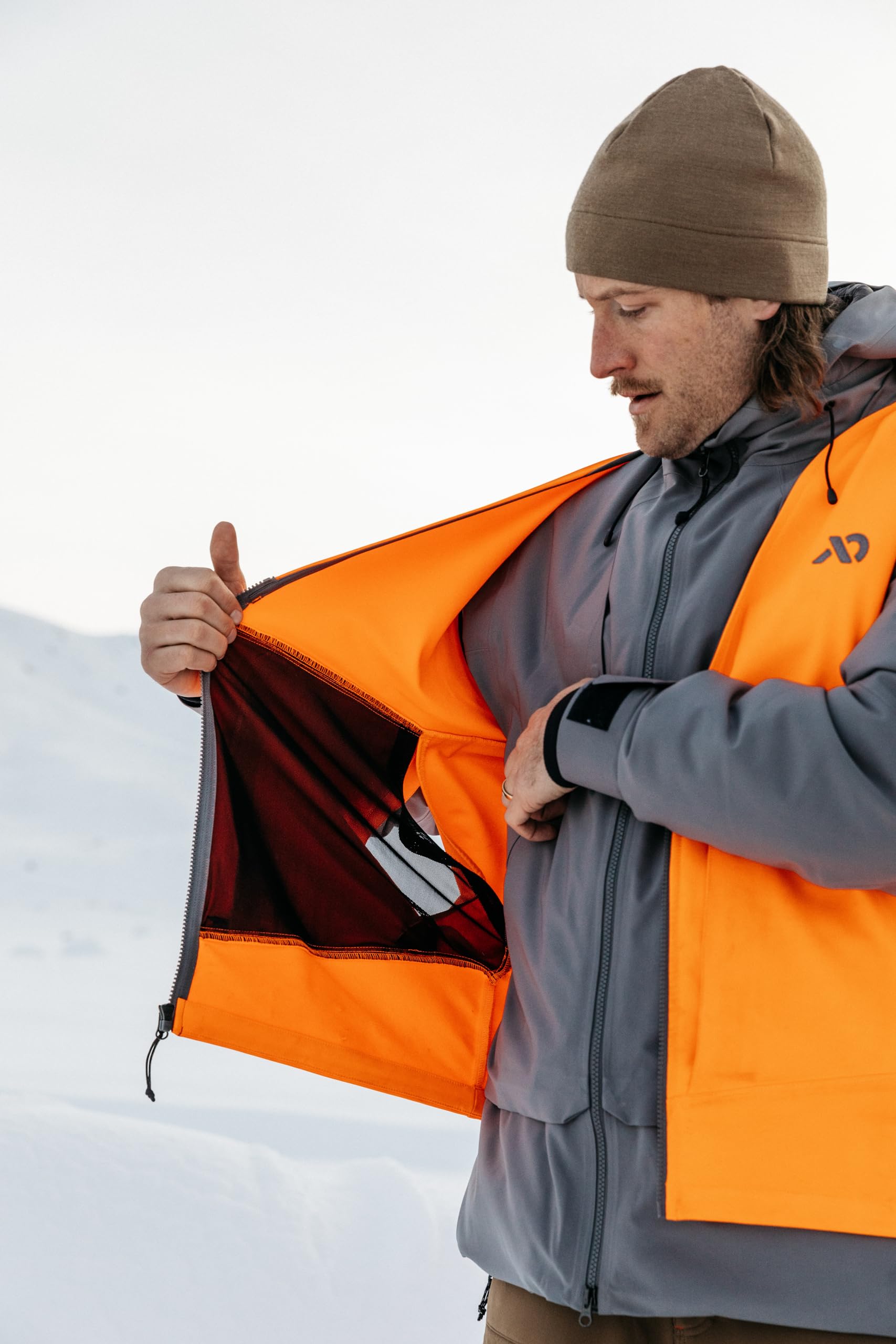 First Lite Men's Charge Hunters Orange Vest - Lightweight High-Visibility Hunting Vest for Safety & Comfort | Perfect for Deer Hunting, Turkey Hunting & Outdoor Adventures