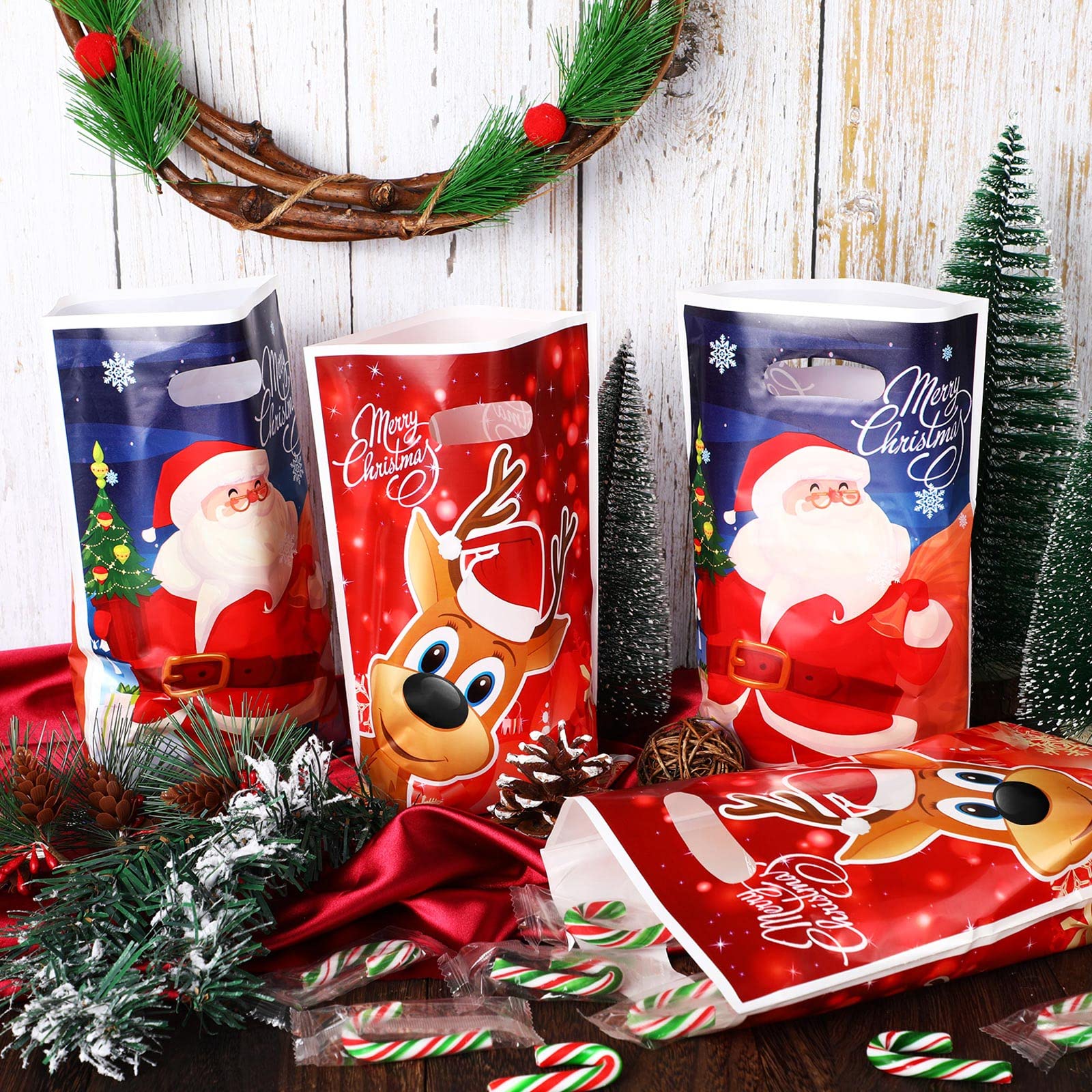 100 Pcs Christmas Plastic Goodie Bags - Santa & Elk Holiday Treat Bags for Party Favors, Gift Giving & Classroom Use - Perfect for Xmas Party Decorations, Candy Packaging & School Events
