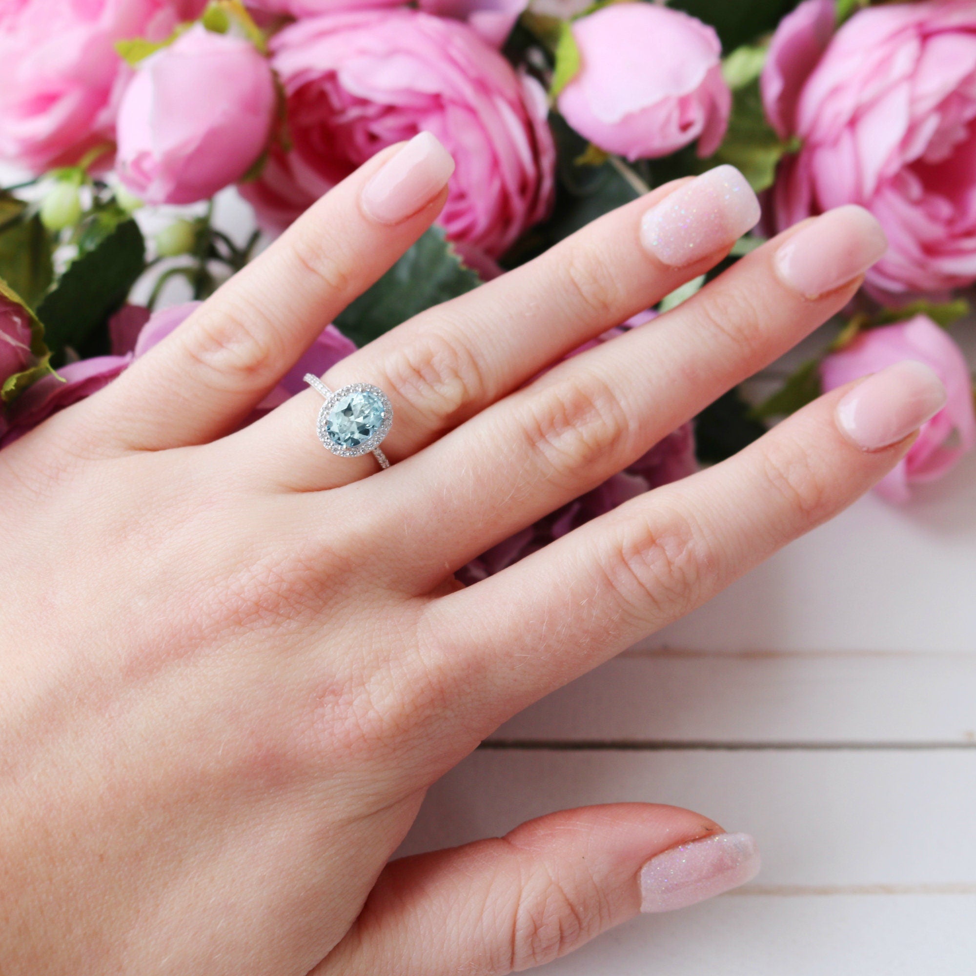 Elegant Iris Halo Oval Aquamarine Sterling Silver Ring for Women | Perfect for Engagement, Anniversary & Special Occasion Gifts