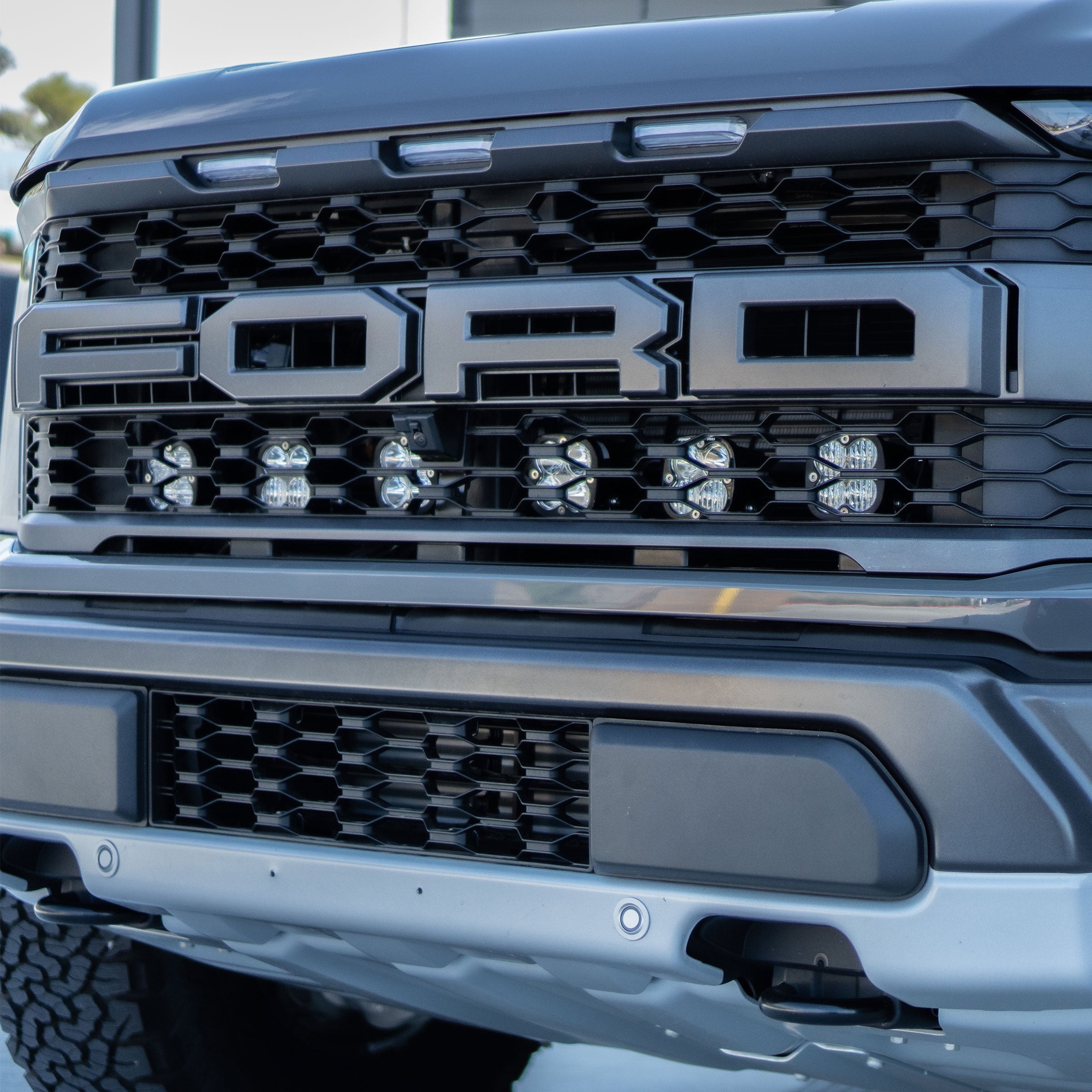 2021-2023 Ford Raptor Baja Designs Squadron Series Behind the Grille Light Kit - Off-Road LED Lighting for Enhanced Visibility & Style