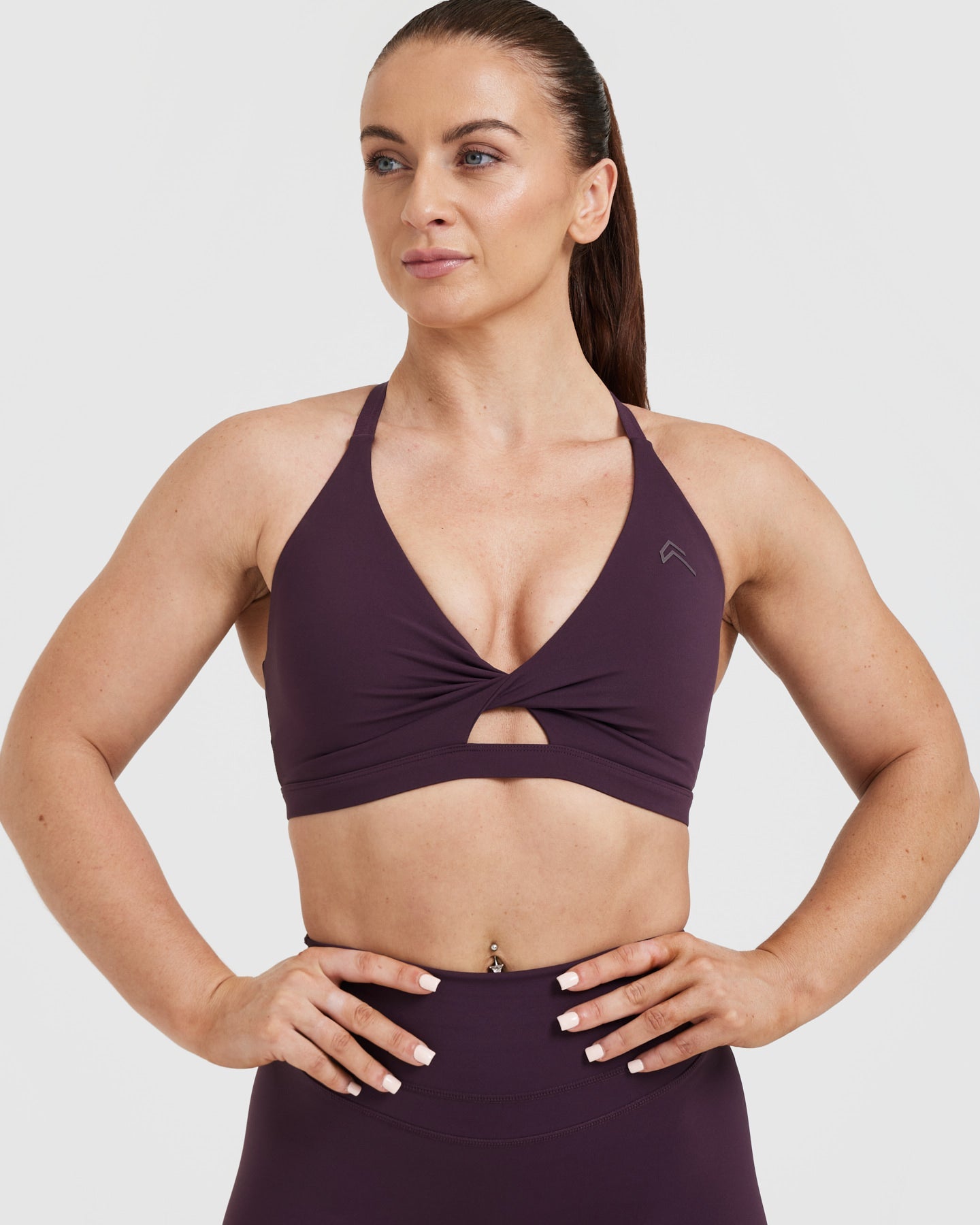High-Performance Unified Twist Sports Bra in Blackberry Purple - Perfect for Yoga, Running & Gym Workouts