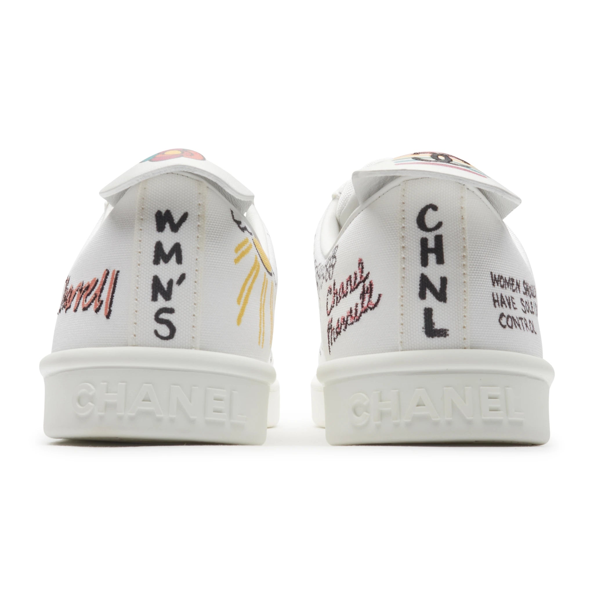 Chanel x Pharrell White Canvas Sneakers - Authentic Pre-Owned Luxury Shoes for Men | Streetwear Fashion, Casual Wear & Collector's Item