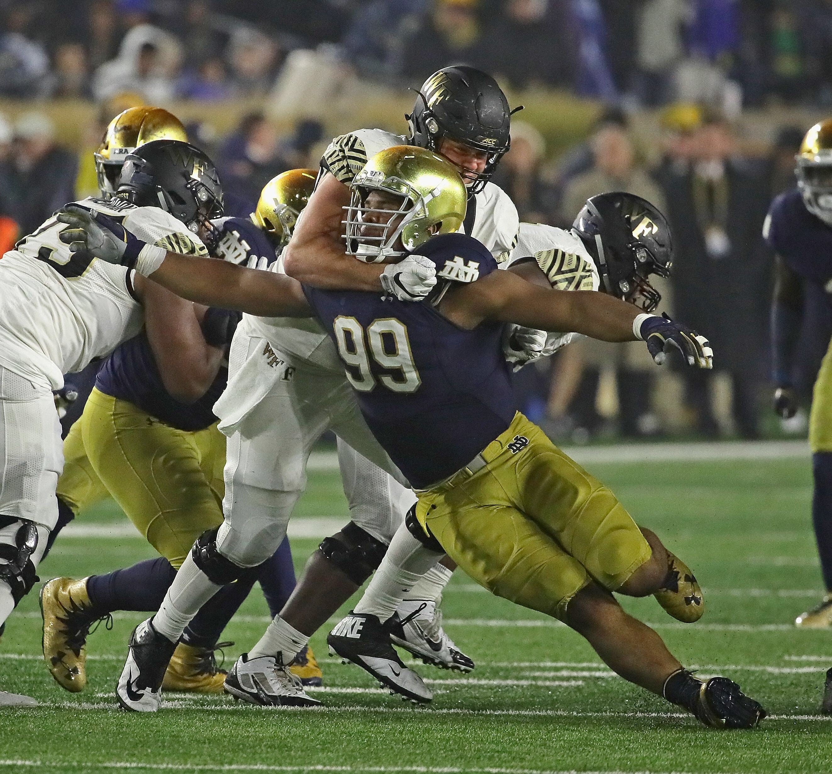 Authentic Jerry Tillery 2017 Notre Dame Game Used Under Armour Cleats #99 - Perfect for Football Collectors, Sports Memorabilia & Fan Display