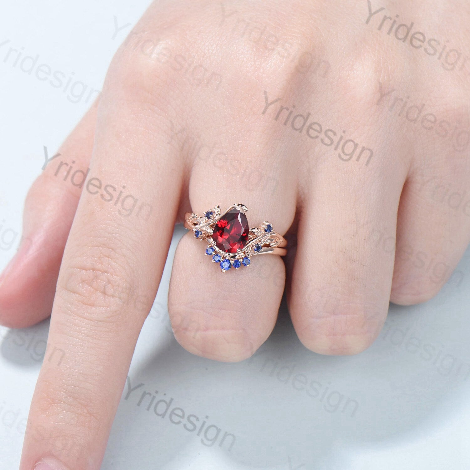 Vintage Nature-Inspired Pear Shaped Ruby Wedding Ring Set - Unique Lab-Created Ruby Engagement Ring with Leaf Cluster Design & Blue Sapphire Accents - Perfect for Women's Anniversary, Proposal, and Special Occasions