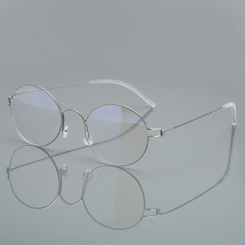 Stylish Black Titanium Full Rim Round Screwless Eyeglasses for Women - Perfect for Reading, Work & Everyday Fashion