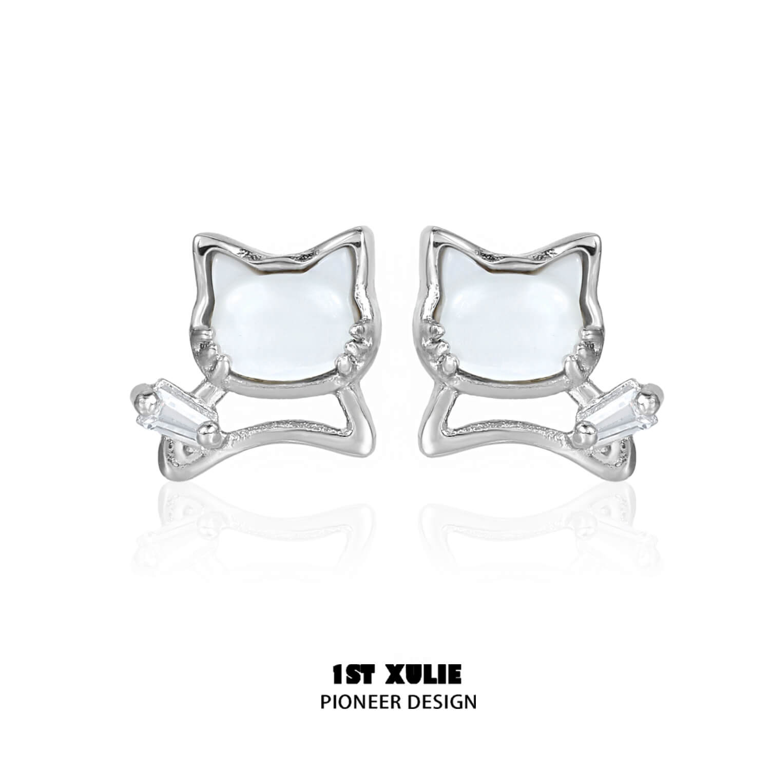 A pair of white earrings