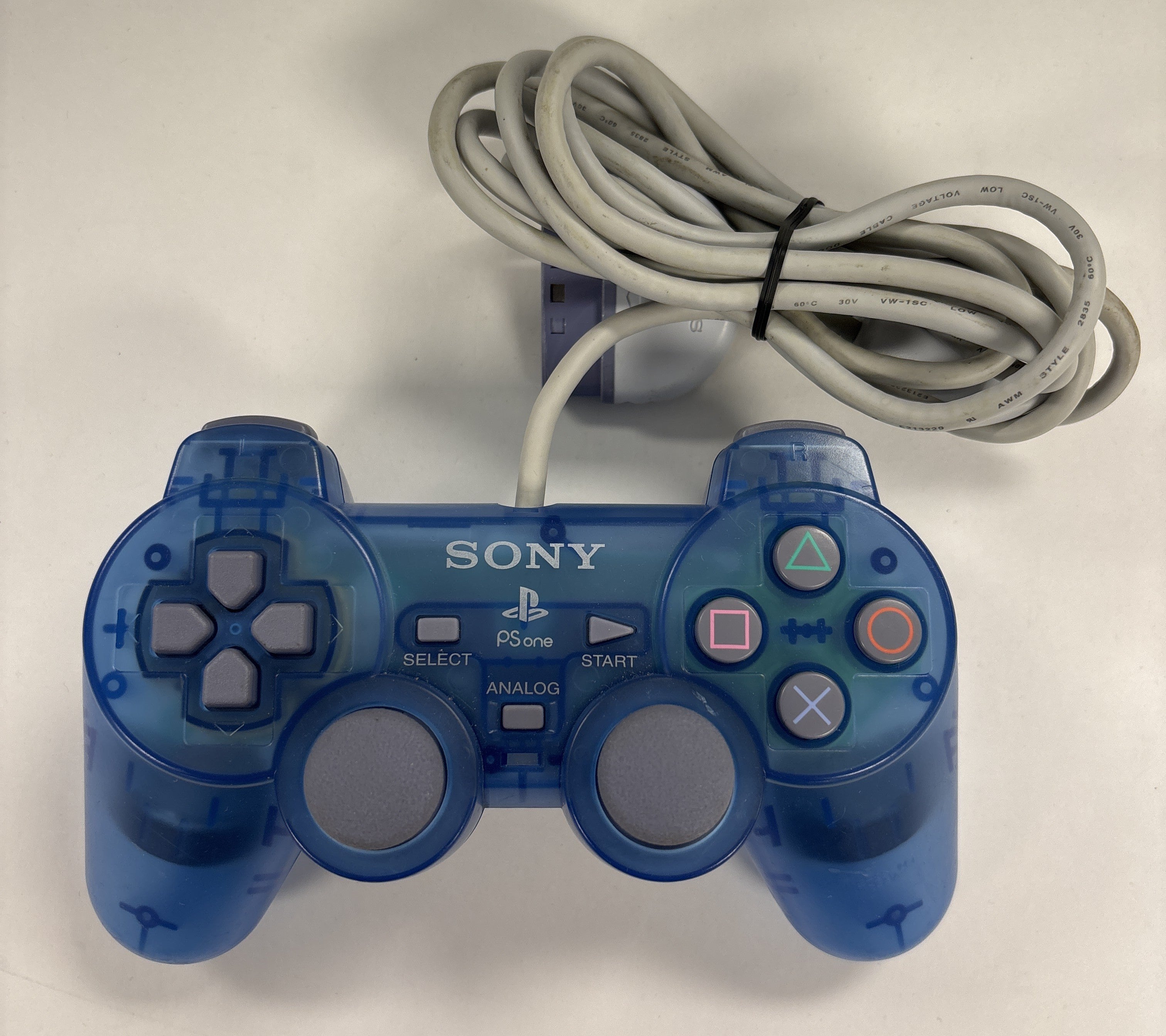 Original PlayStation DualShock Analog Controller - Island Blue | Wireless Gaming Controller for PS4 & PS5 | Perfect for Action, Adventure & Sports Games