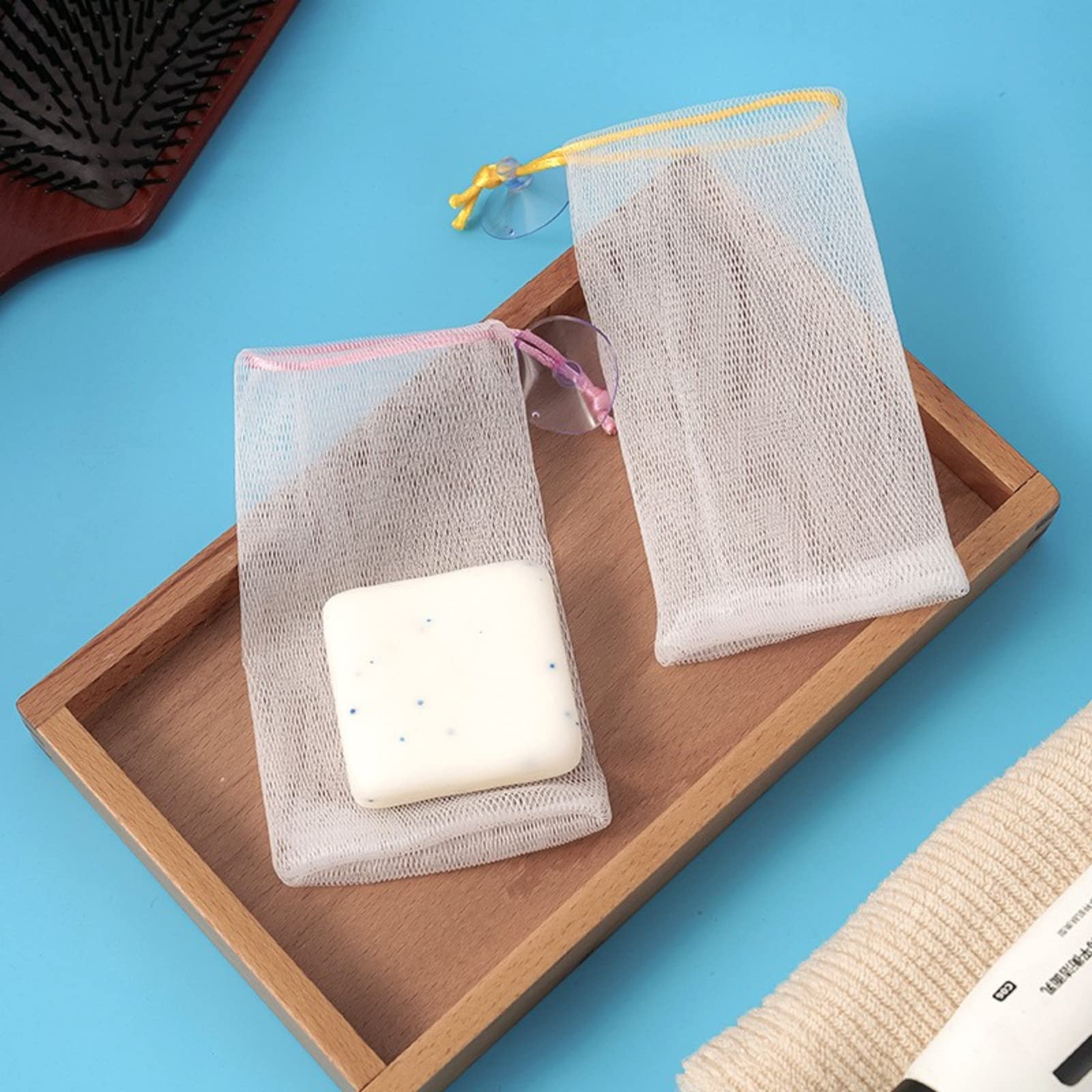 100PCS Exfoliating Mesh Soap Pouches - Reusable Bubble Foaming Net Soap Bags with Drawstring & Suction Cup - Soap Savers for Shower, Bath, Travel & Gym - Gentle Exfoliation & Lather Booster