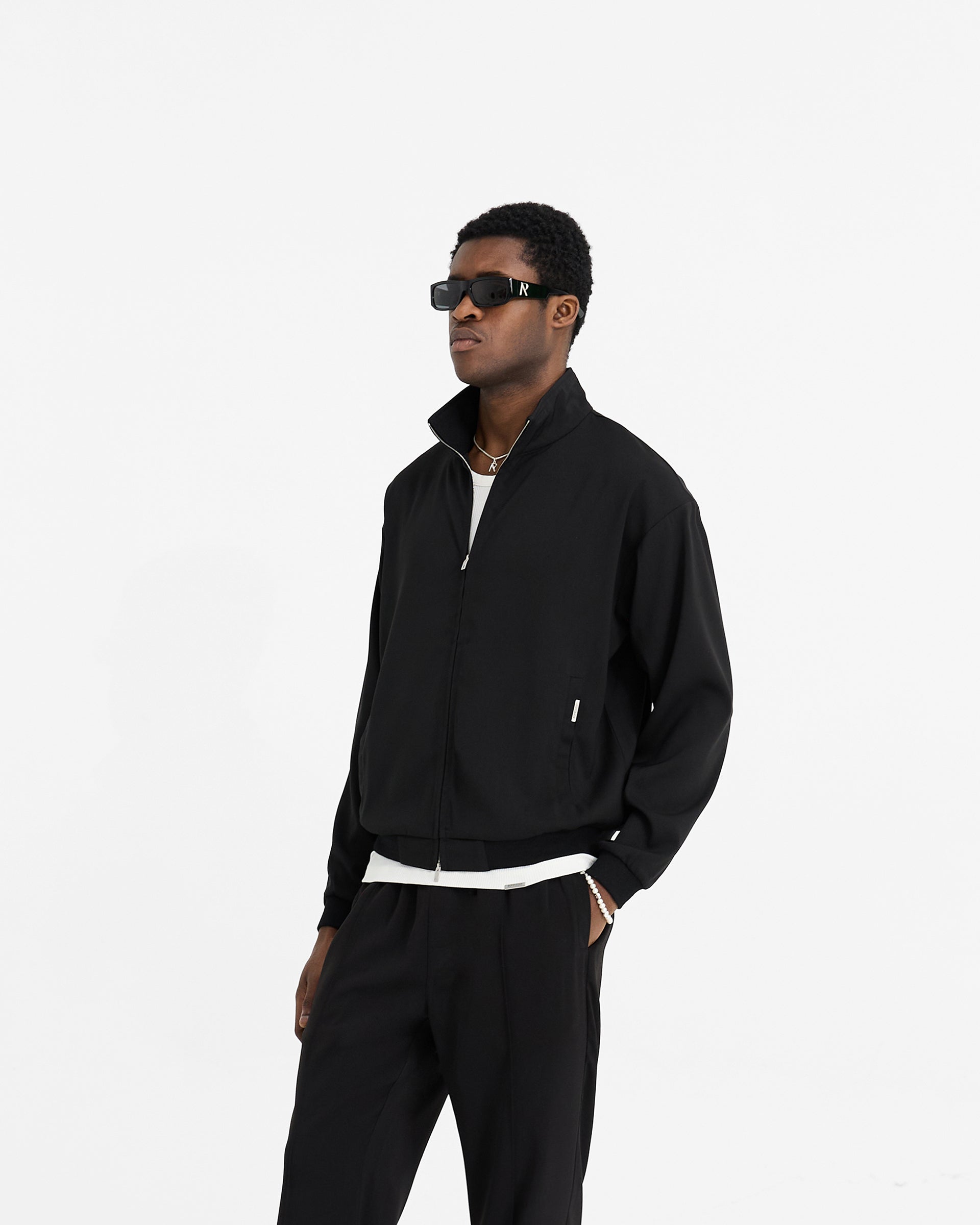 Initial Track Jacket - Black | Stylish Men's & Women's Lightweight Running Jacket for Outdoor Sports & Casual Wear