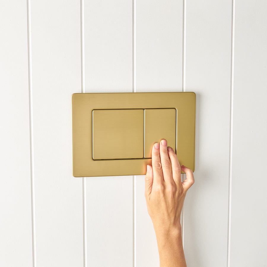 Elegant Curved In-Wall Toilet with Rectangle Brushed Brass Buttons - Modern Water-Saving Bathroom Solution for Home & Commercial Spaces