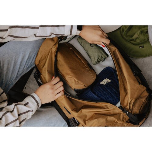 Peak Design Travel Duffel 35L Carry-On Duffel Bag - Waterproof & Durable Coyote Brown Backpack for Adventure Travel, Camping & Outdoor Activities