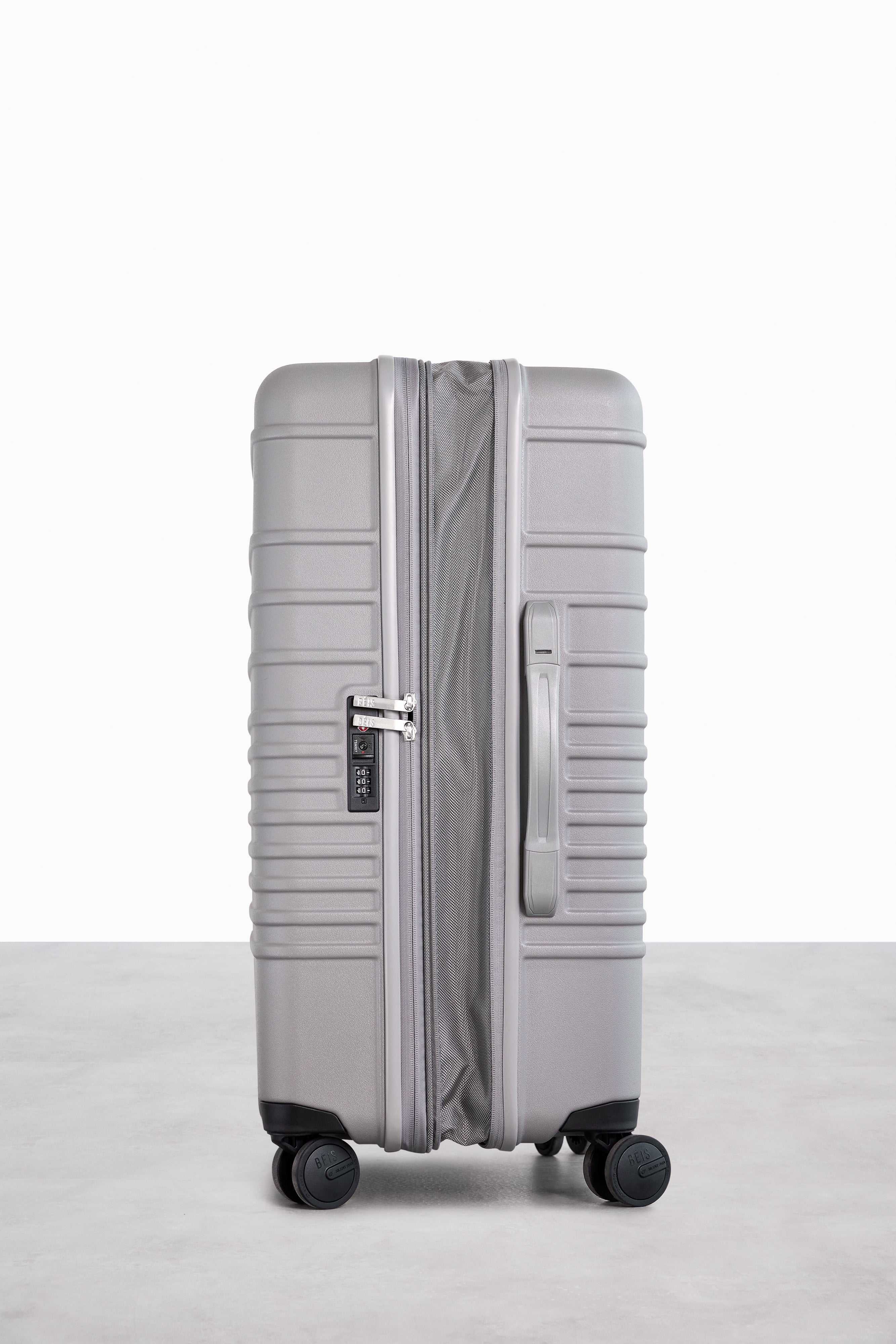 The Medium Check In Roller Luggage in Grey - Perfect for Business Travel & Weekend Getaways