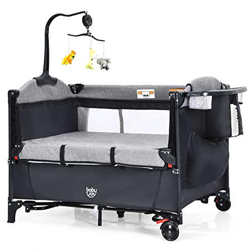 BABY JOY 5-in-1 Pack and Play with Bassinet | Portable Baby Bedside Sleeper & Playard for Newborn to Toddler | Includes U-Shaped Diaper Changer, Safety Strap, Music Box & Hanging Toys | Perfect for Nursery, Travel & Co-Sleeping (Black)