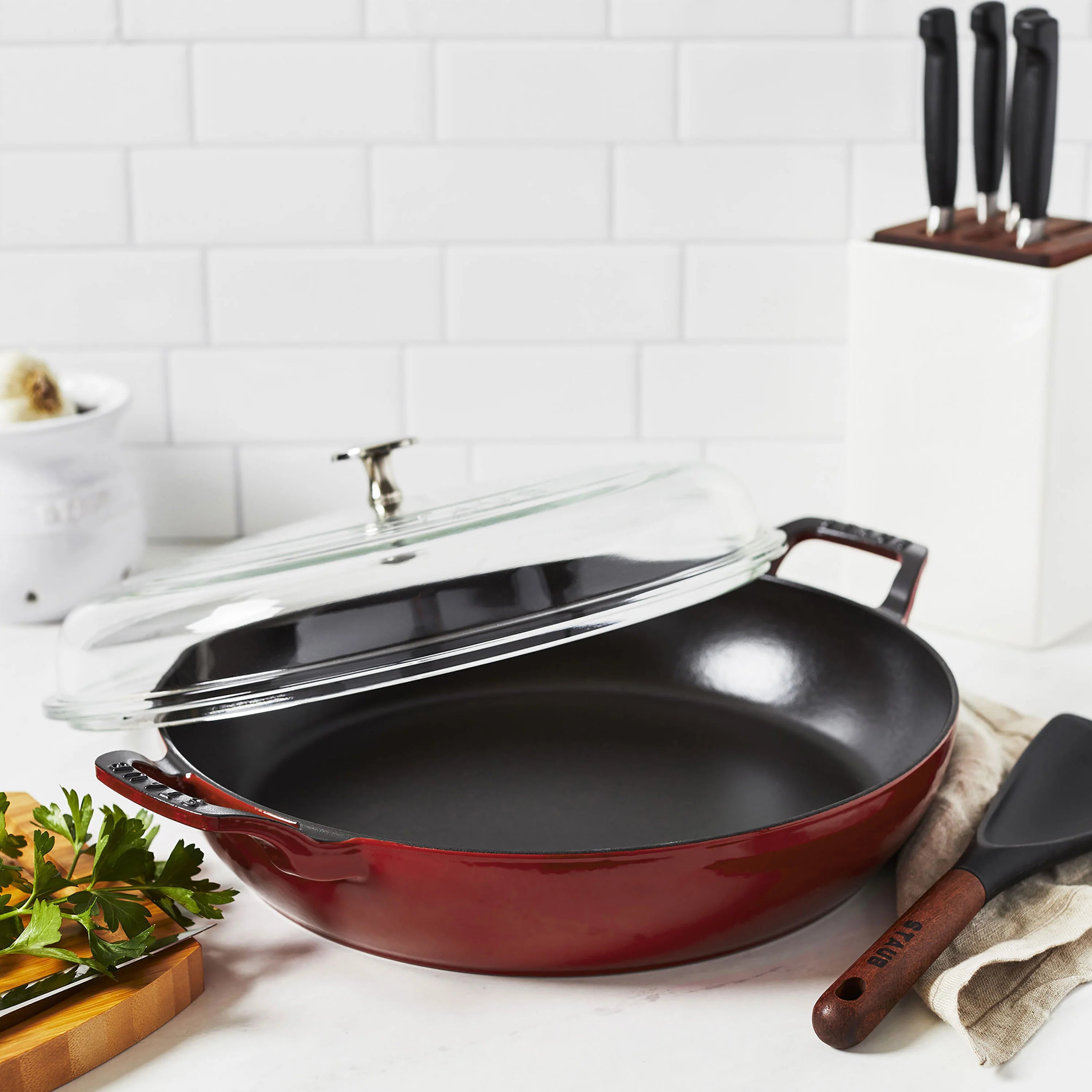 Staub Cast Iron Braiser with Glass Lid - 5.5 QT Grenadine Red Enameled Dutch Oven for Roasting, Baking & Searing - Perfect for Stovetop, Oven & Camping Cooking
