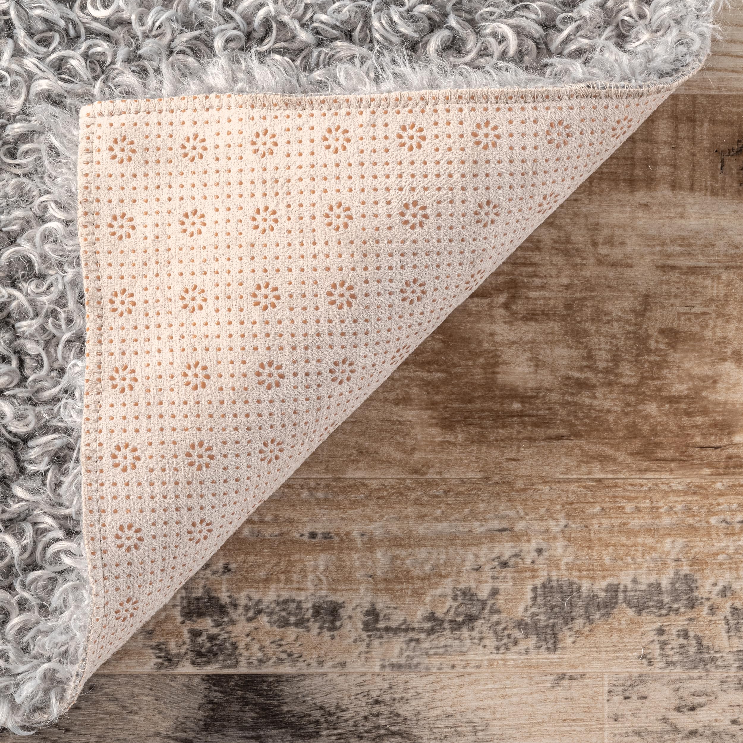 nuLOOM Marlow Machine Washable Soft Shaggy Faux Sheepskin Area Rug 6x9 Feet, Light Grey - Plush Living Room Rug, Cozy Bedroom Carpet, Pet-Friendly Floor Mat for Home Decor