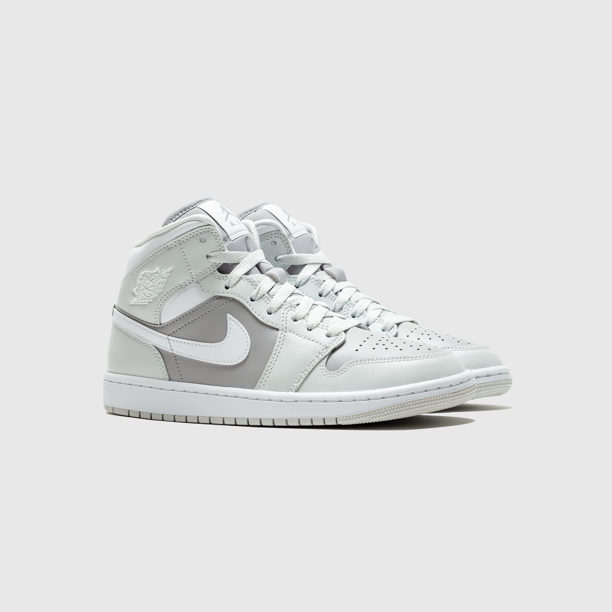 Women's Air Jordan 1 Mid Sneakers in Atmosphere Grey - Perfect for Casual Wear, Street Style & Basketball Enthusiasts