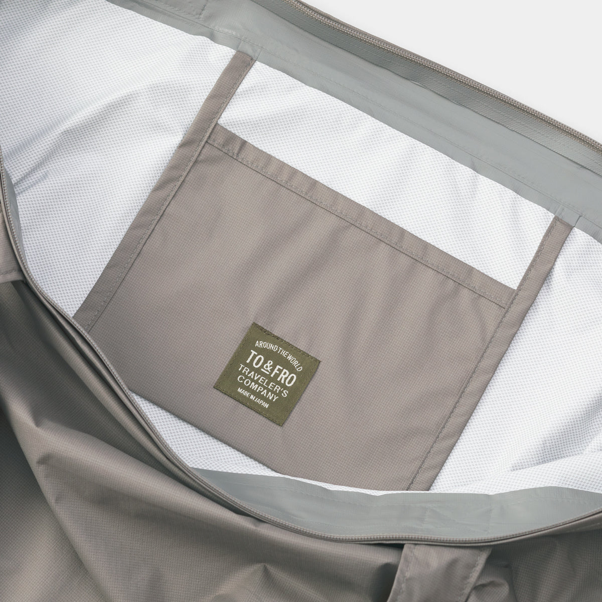 TRAVELER'S COMPANY Traveler's Factory x TO&FRO Waterproof Rain Bag in Warm Gray - Perfect for Outdoor Adventures, Commuting & Travel
