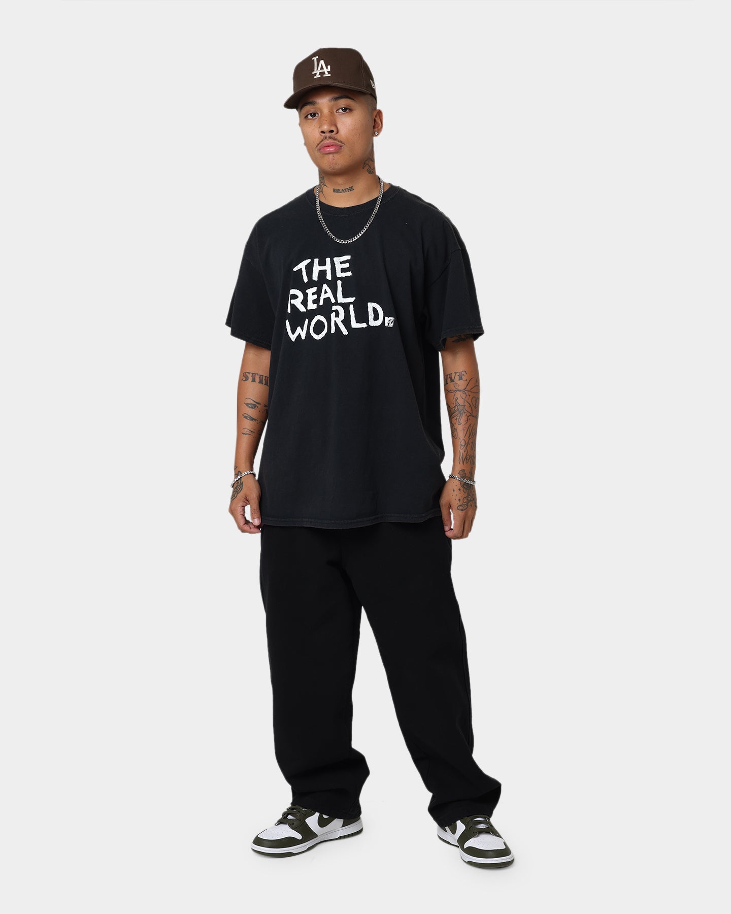 Vintage MTV The Real World Graphic T-Shirt - Black Wash Distressed Style - Perfect for Casual Wear, Retro Parties & 90s Nostalgia Fans