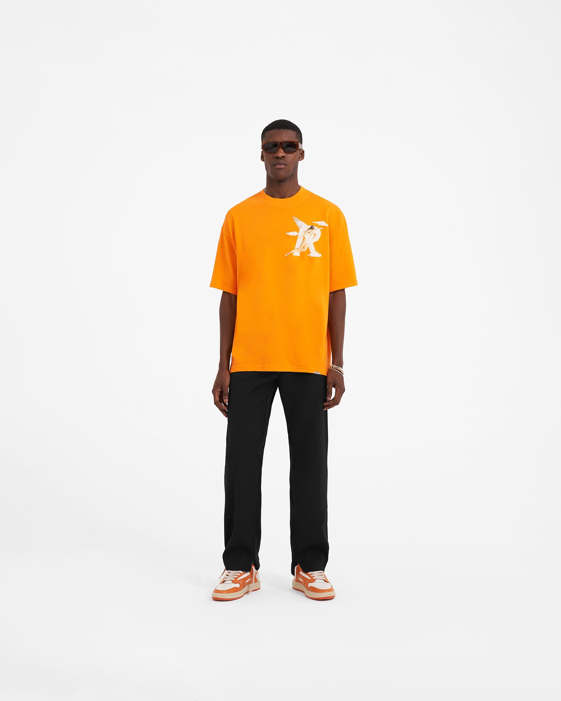 Storms in Heaven Graphic T-Shirt - Neon Orange Color for Men & Women - Perfect for Concerts, Festivals, and Casual Streetwear