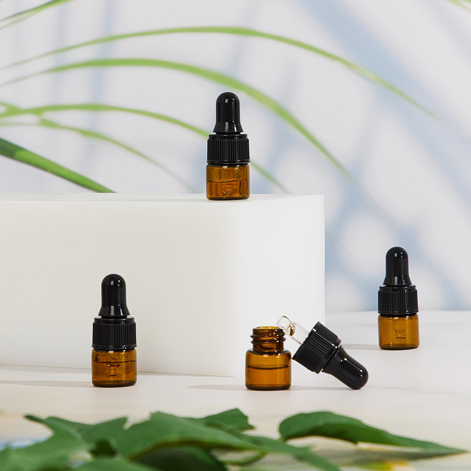 200 Pcs 1ml Amber Mini Glass Dropper Bottles with Lids - Travel Essential Oil Containers, Cosmetic Sample Vials, Perfume Liquid Storage - Perfect for DIY Beauty Products, Aromatherapy & Travel Toiletries