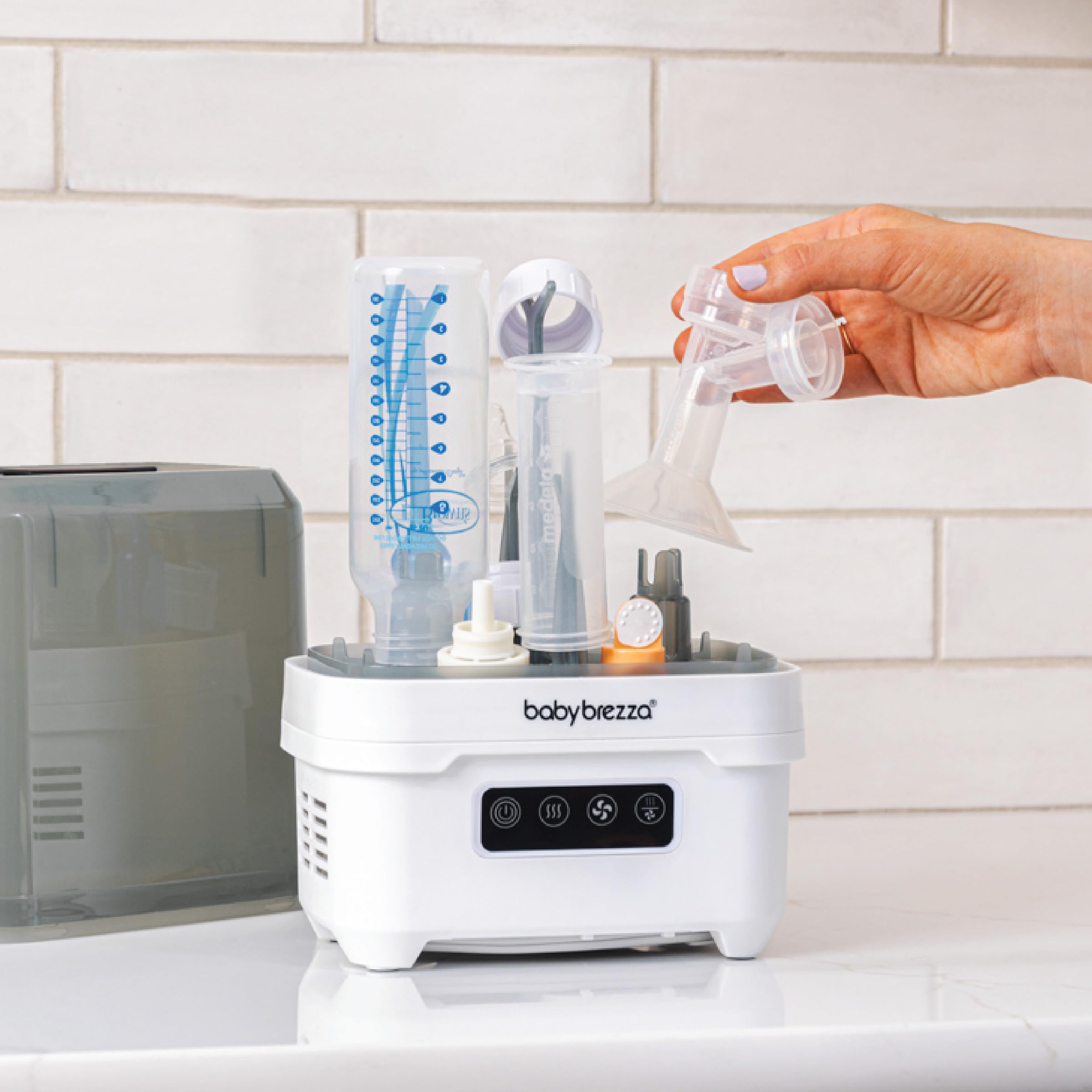 Baby Brezza Portable Baby Bottle Sterilizer and Dryer for Travel - Compact Mini Sterilizer for Bottles, Pump Parts & Accessories | Perfect for On-the-Go Parents, Daycare & Hospital Use
