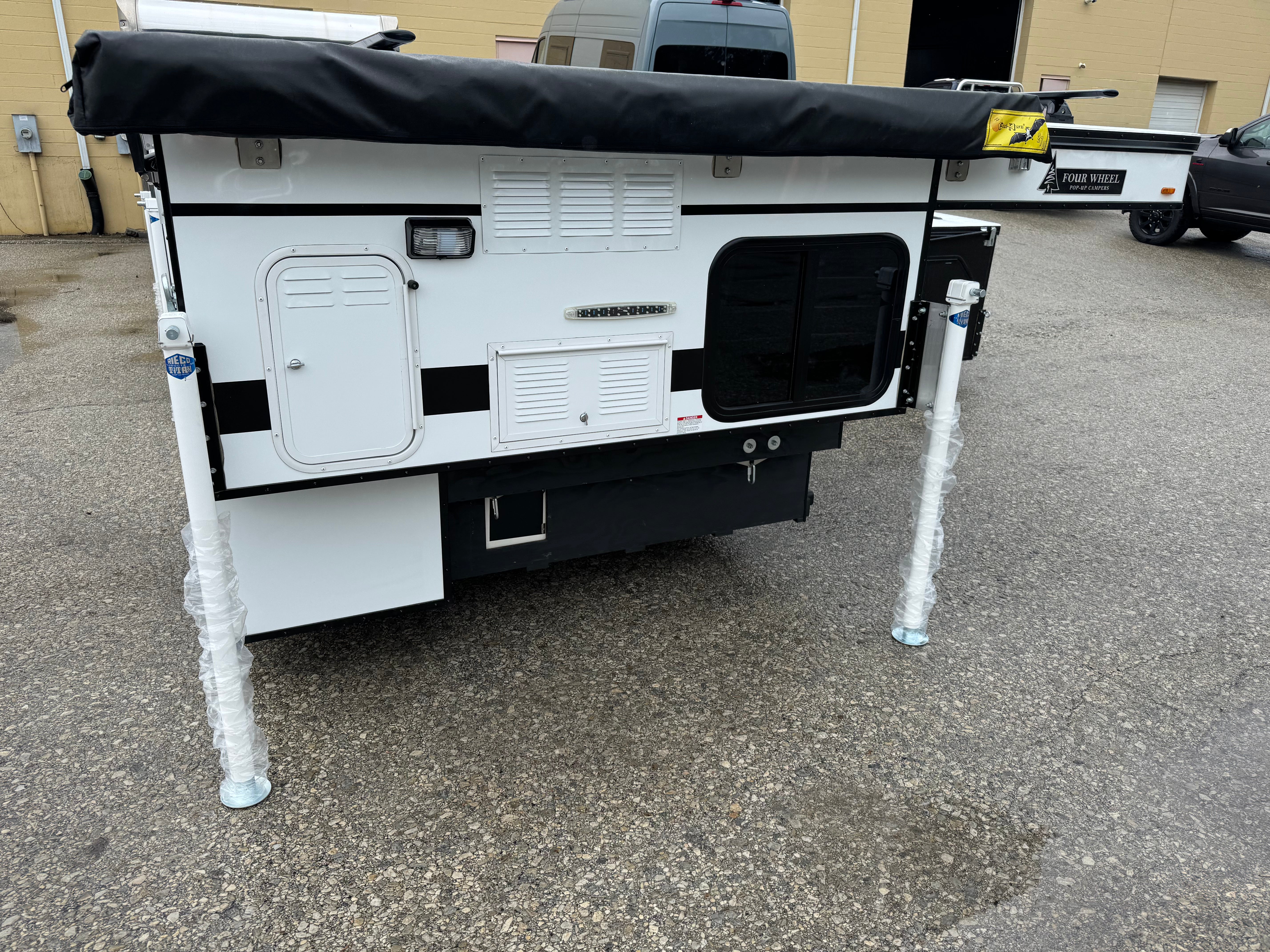 2022 Hawk Four Wheel Camper with Front Dinette - Used RV for Sale | Perfect for Road Trips & Outdoor Adventures