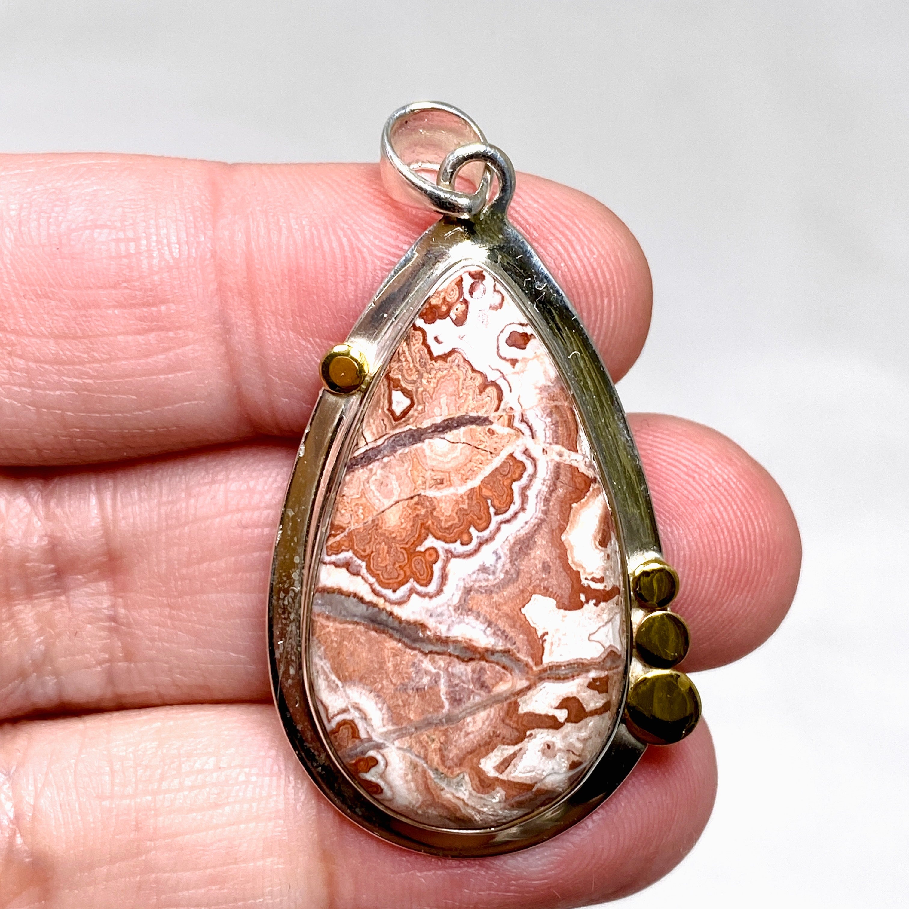 Crazy Lace Rosetta Stone Teardrop Pendant with Brass Decorative Setting KPGJ4569 - Elegant Bohemian Jewelry for Women, Perfect for Casual Wear, Date Nights & Special Occasions