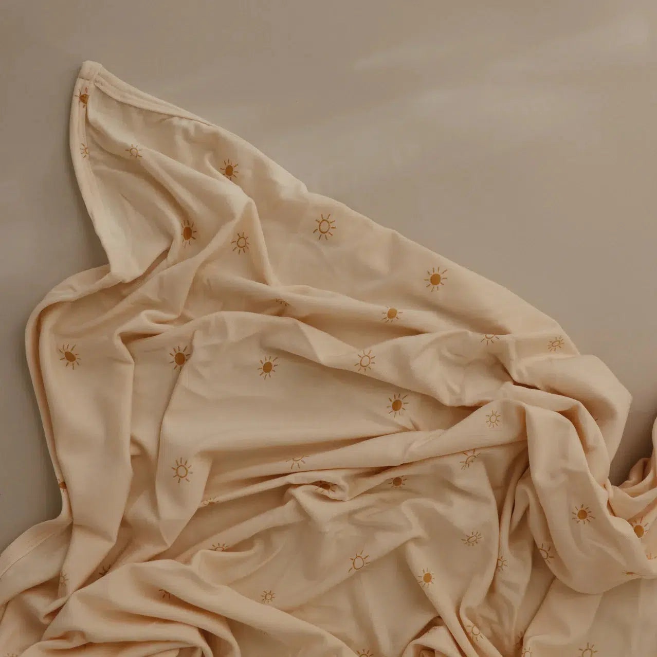 Mushie Stretchy Swaddle Blanket for Babies - Soft & Breathable Cotton Newborn Wrap - Perfect for Sleeping, Swaddling & Comfort (Sun Pattern)