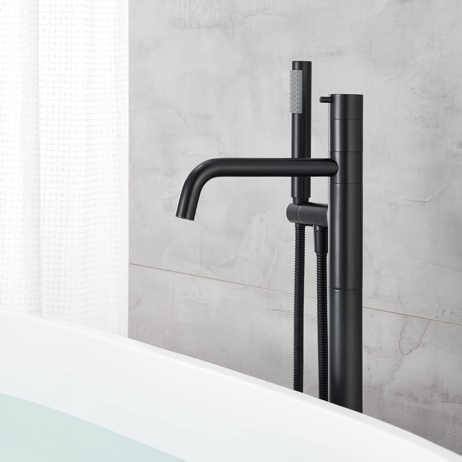 Freestanding Bathtub Faucet - Black Floor Mount Brass Single Handle Tub Filler with Hand Shower for Modern Bathroom | Perfect for Spa-Like Relaxation & Luxury Bathing Experience