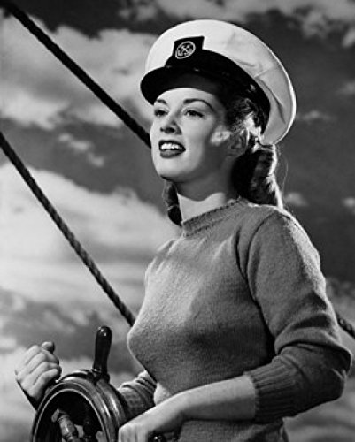 Female Sailor Steering Boat and Smiling - 18x24 Inch Nautical Wall Art Poster - Perfect for Home, Office, or Boat Decor